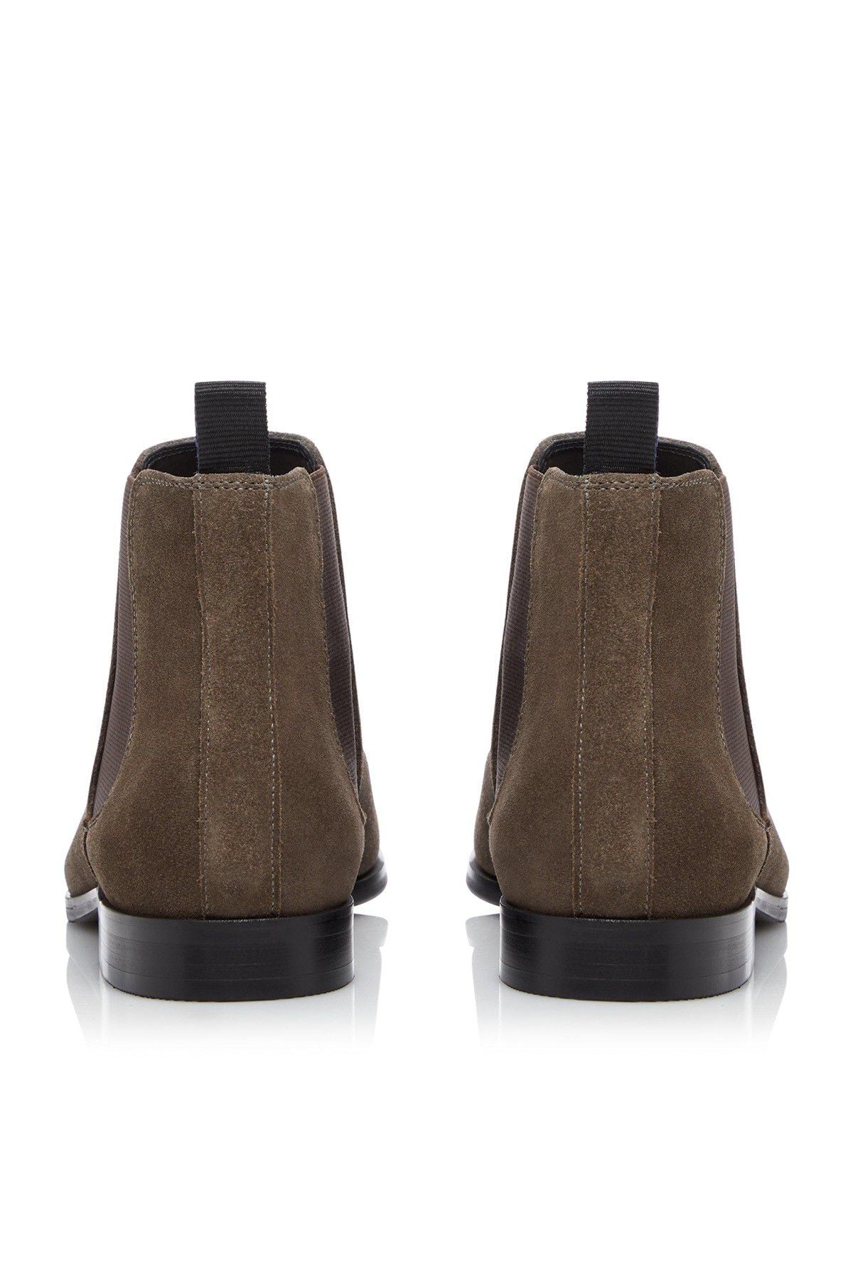 Taupe suede Chelsea ankle boots, rear view, elastic gore and black heel