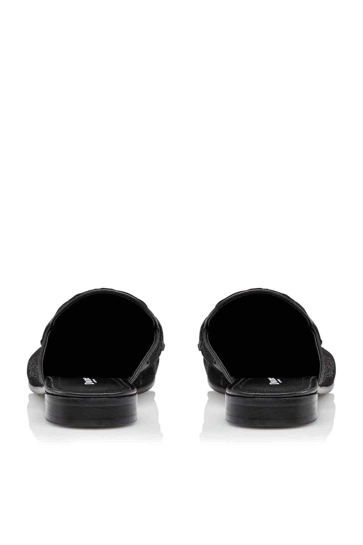 Pair of black mule slides with open back and cushioned black insoles