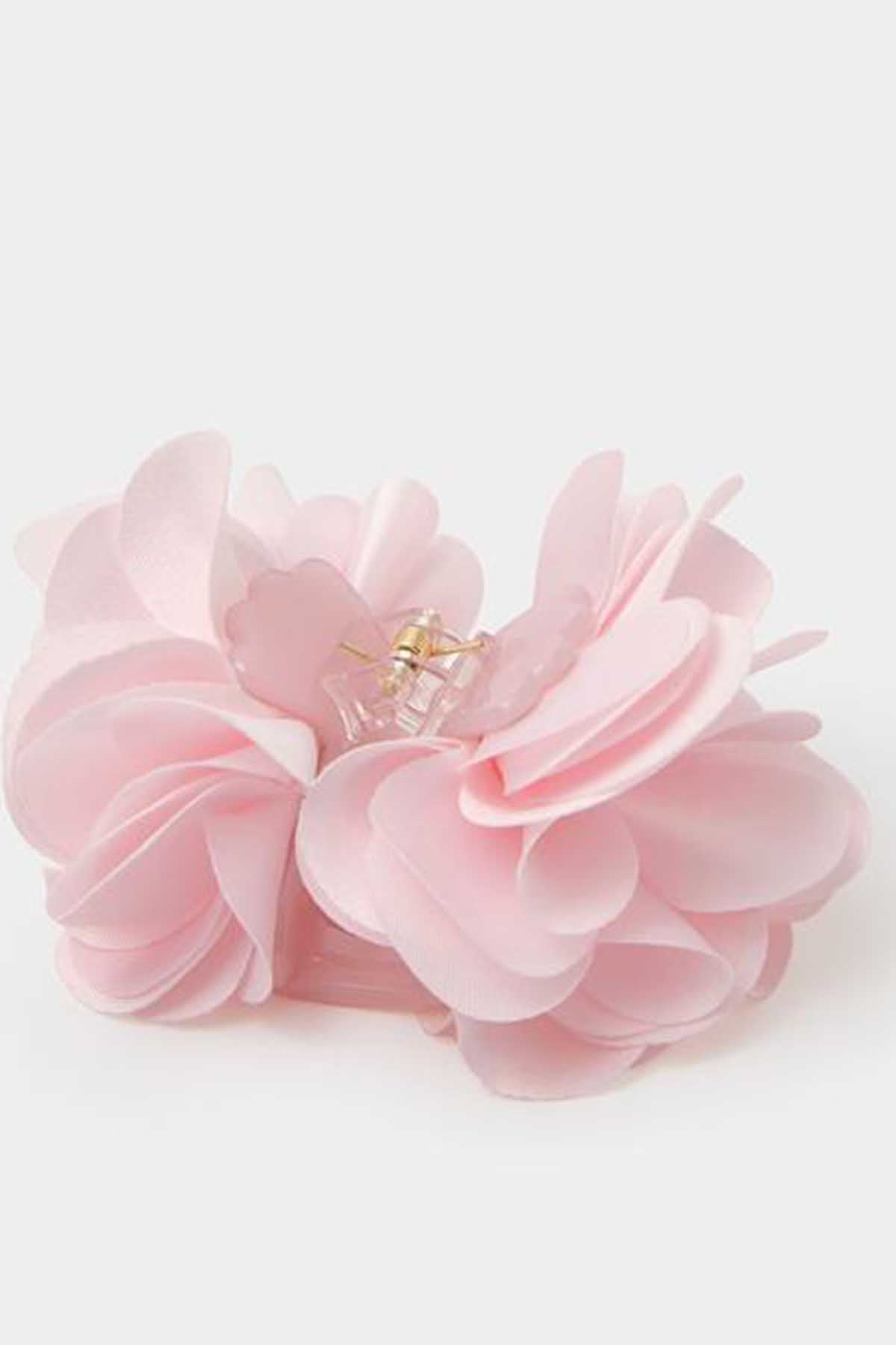 Pink fabric flower hair clip with gold center charm