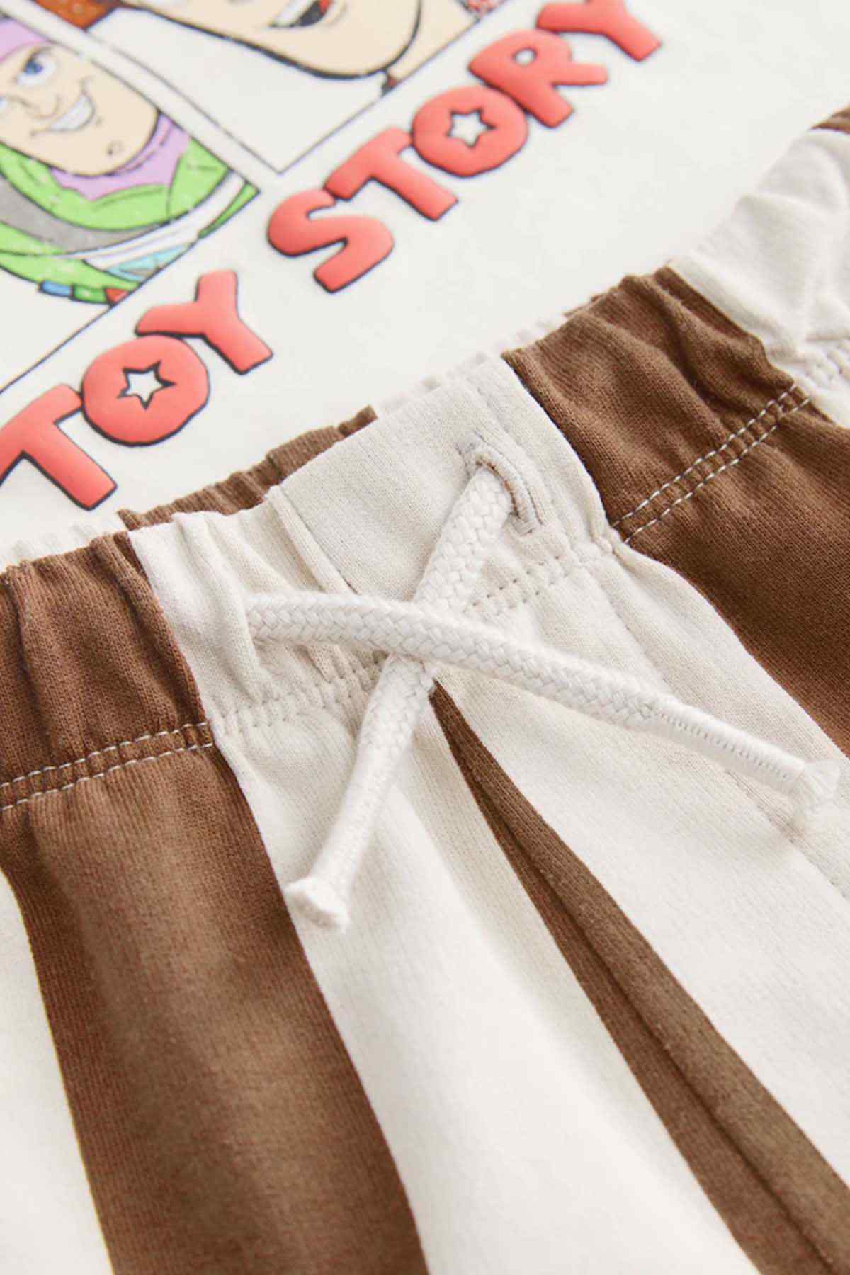 Kids brown-striped shorts detail with elastic waist and ecru top hem seam