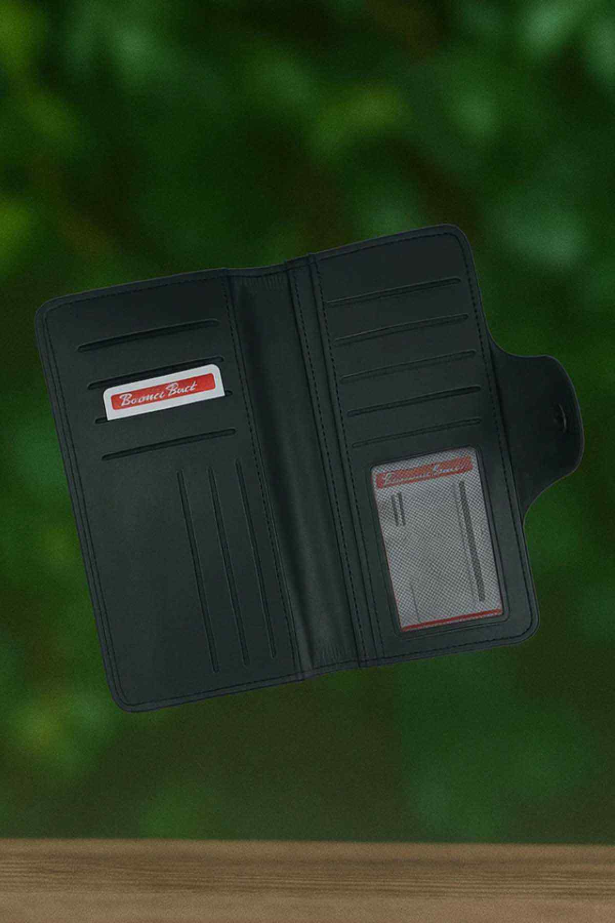 Dark leather bifold wallet open with card slots and ID window