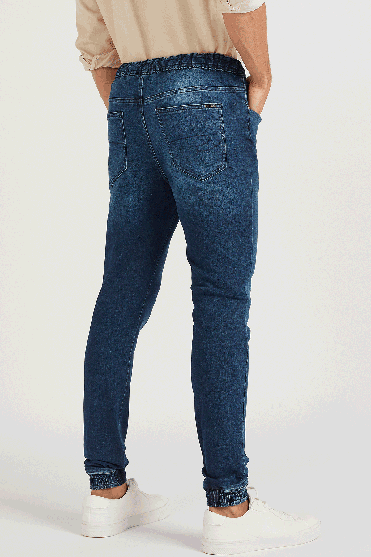 Blue denim jogger jeans with back yoke and patch back pocket