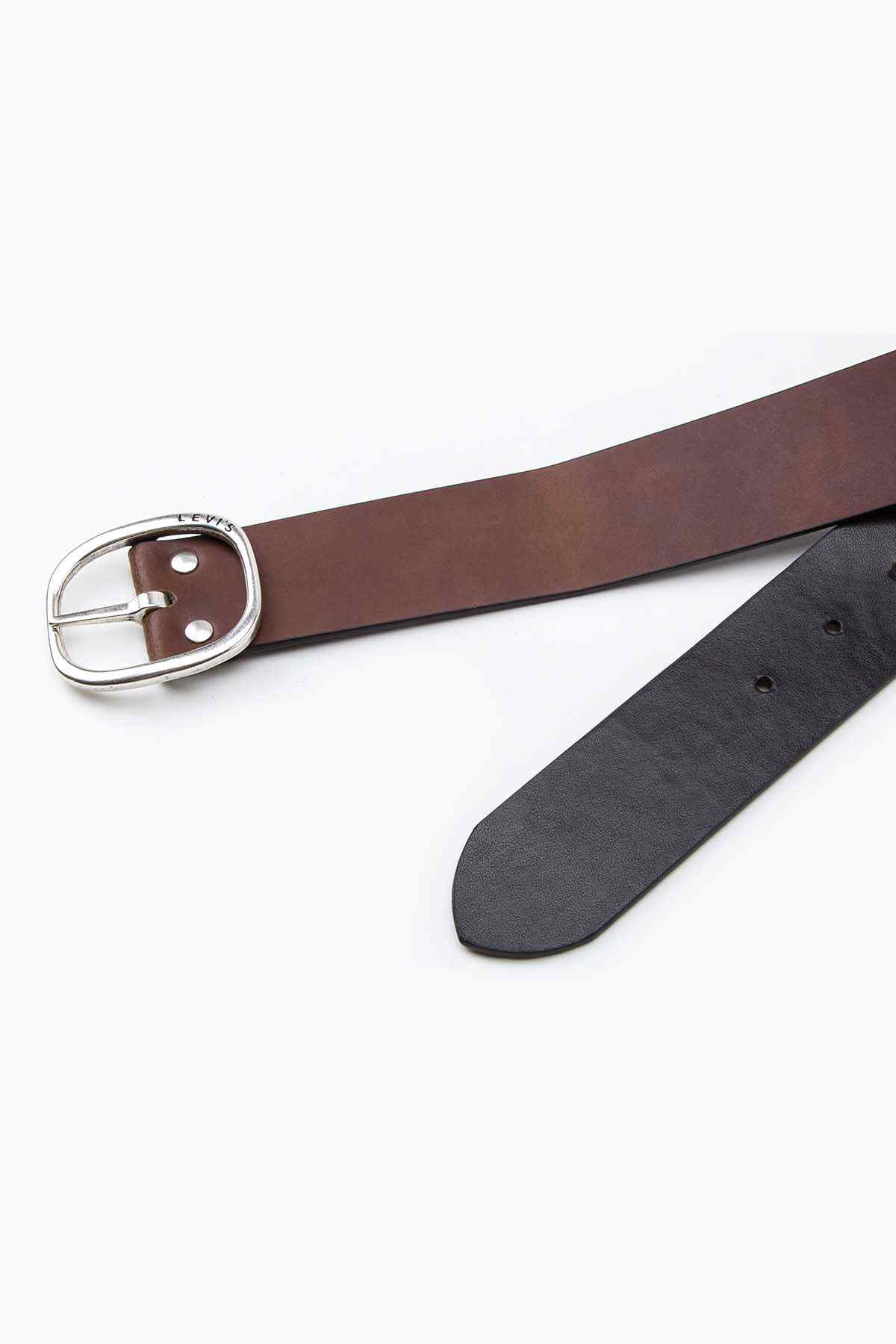 Levi's brown leather belt with silver oval buckle and punched holes.