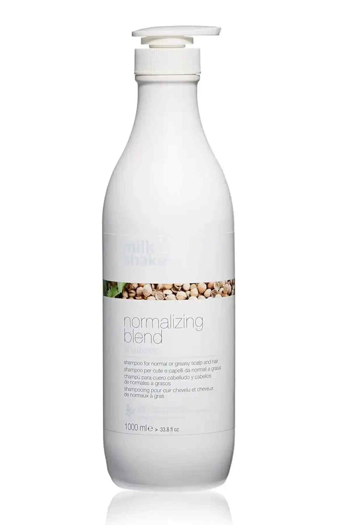 MILK SHAKE normalizing blend bottle with white label and flip-top cap