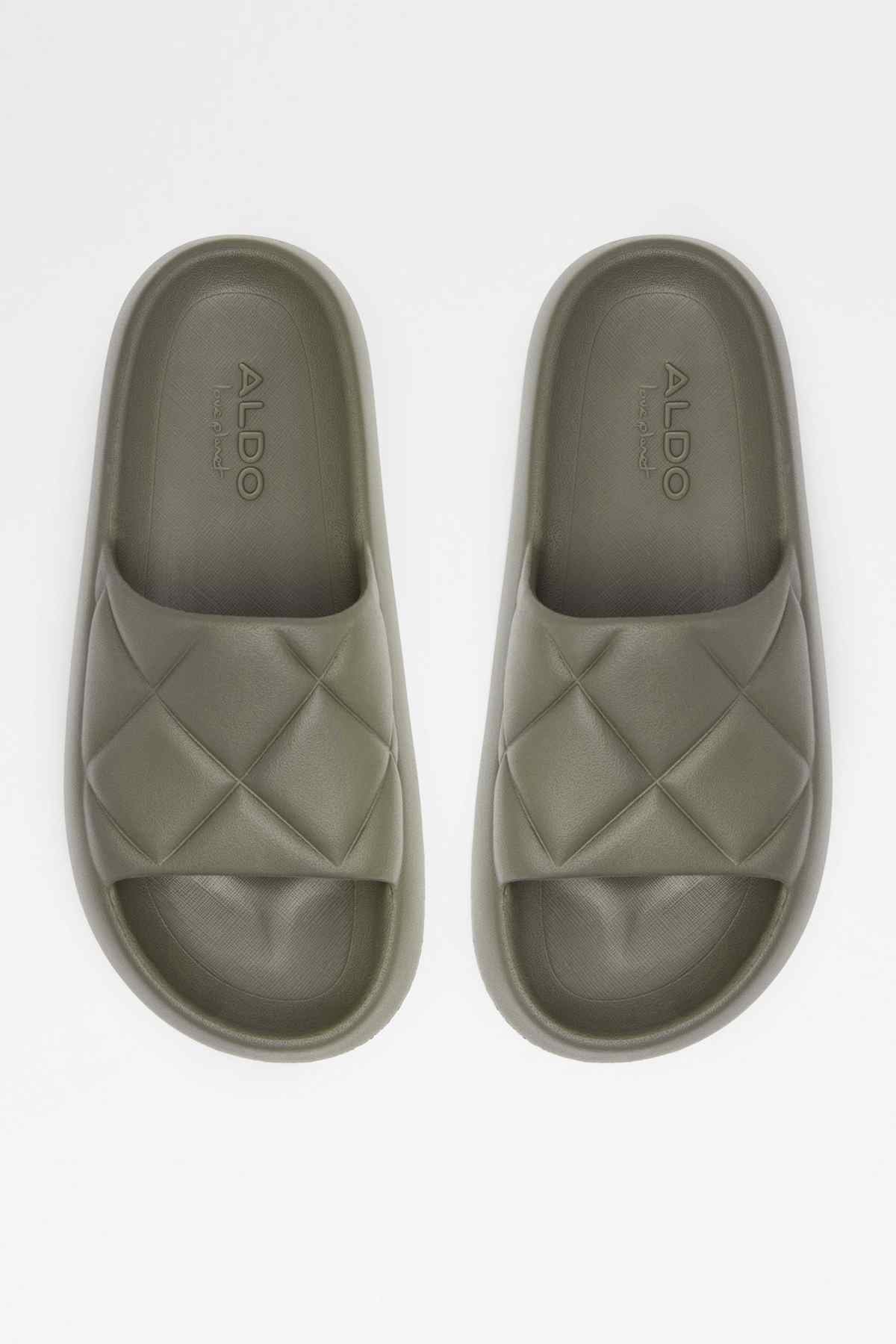 Khaki slide sandals, top view, quilted straps and embossed insole text