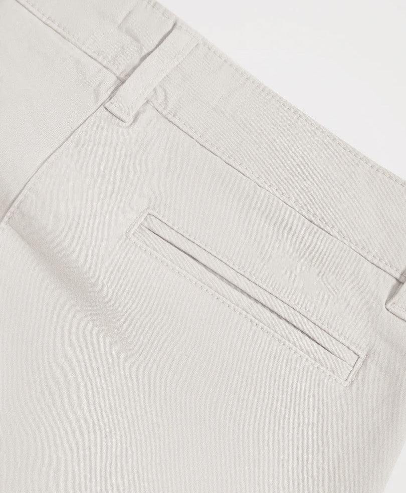 Fitted light beige pants pocket with rectangular flap detail