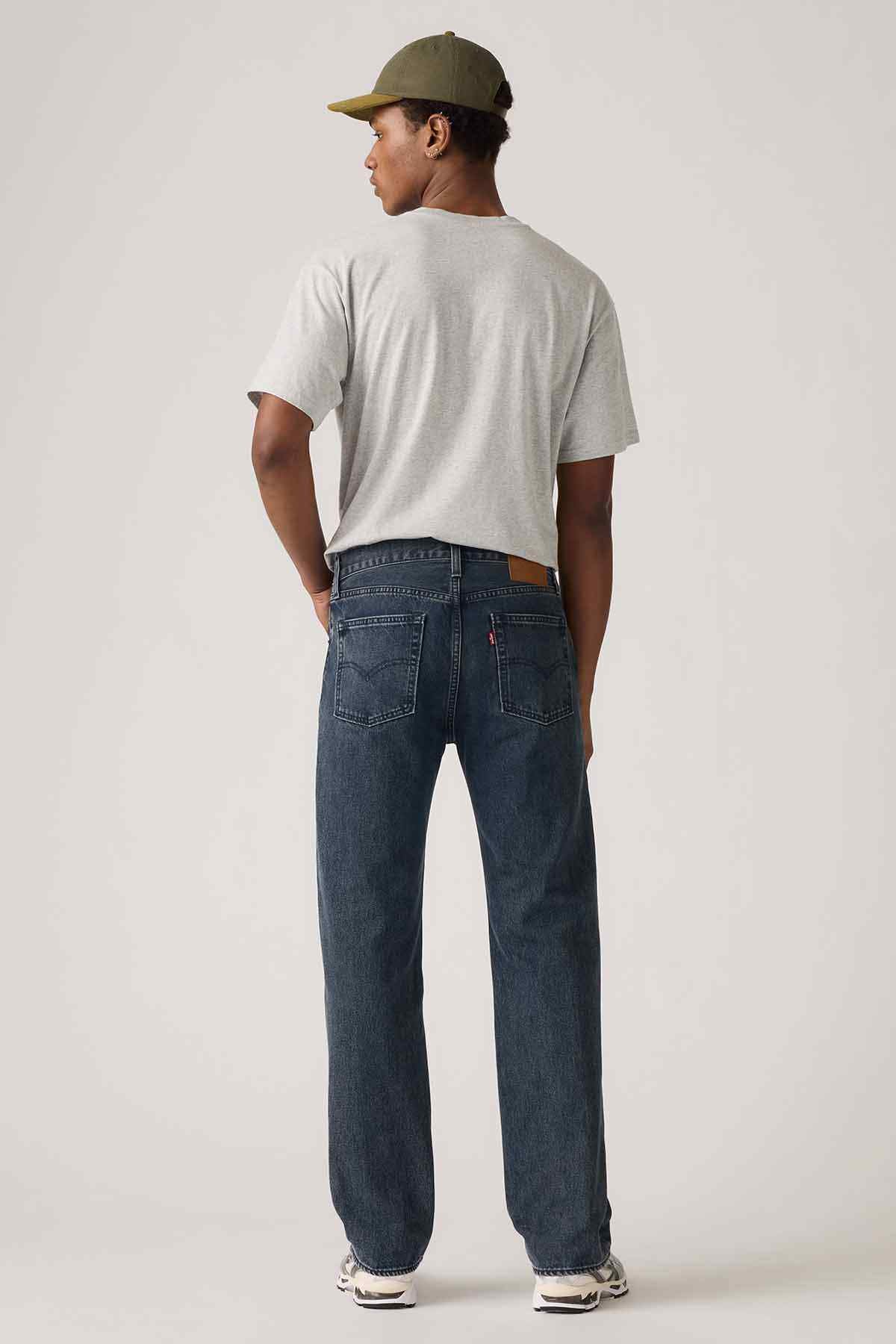 Levi's blue jeans back view with rear pockets and yoke, straight-leg fit