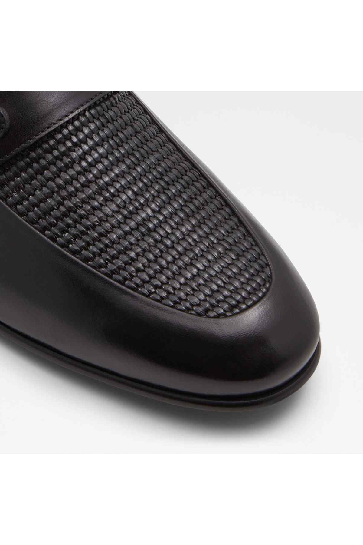 Black loafer vamp with textured knit panel on the top edge