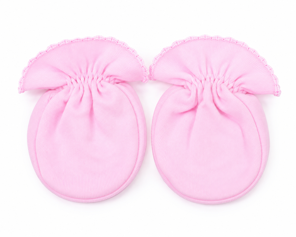 Pink baby booties pair with ruched cuffs and round toe