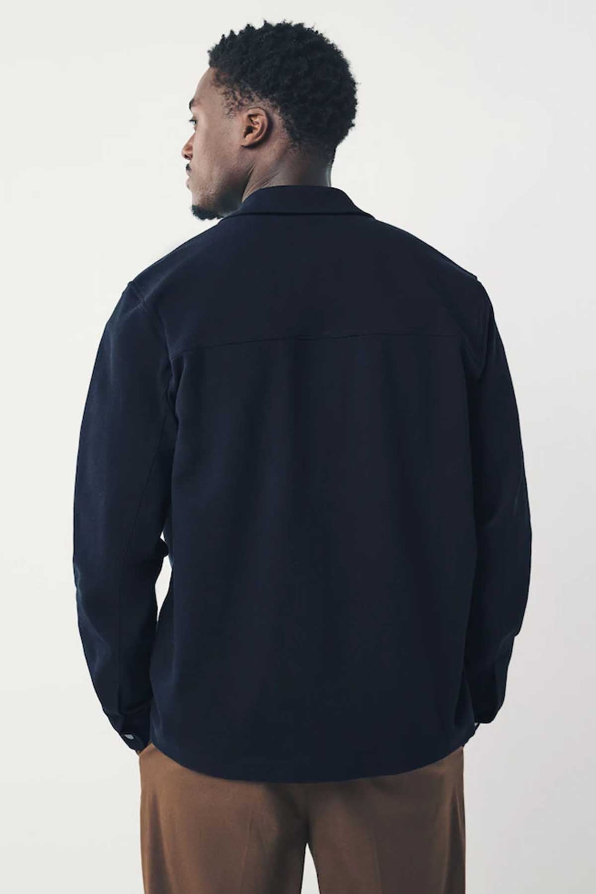 Men's navy shirt jacket back view with full-length sleeves