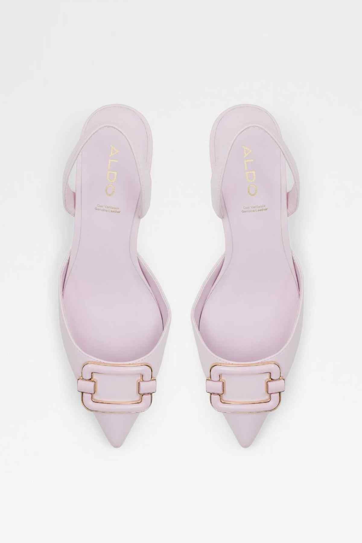 Pair of pink pointed-toe slingback pumps with gold buckle front detail