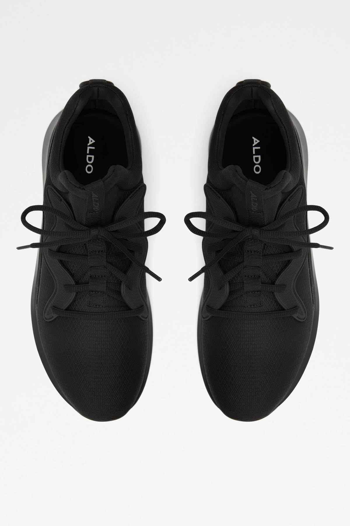 Black lace-up sneakers with ALDO logo on inner tongue