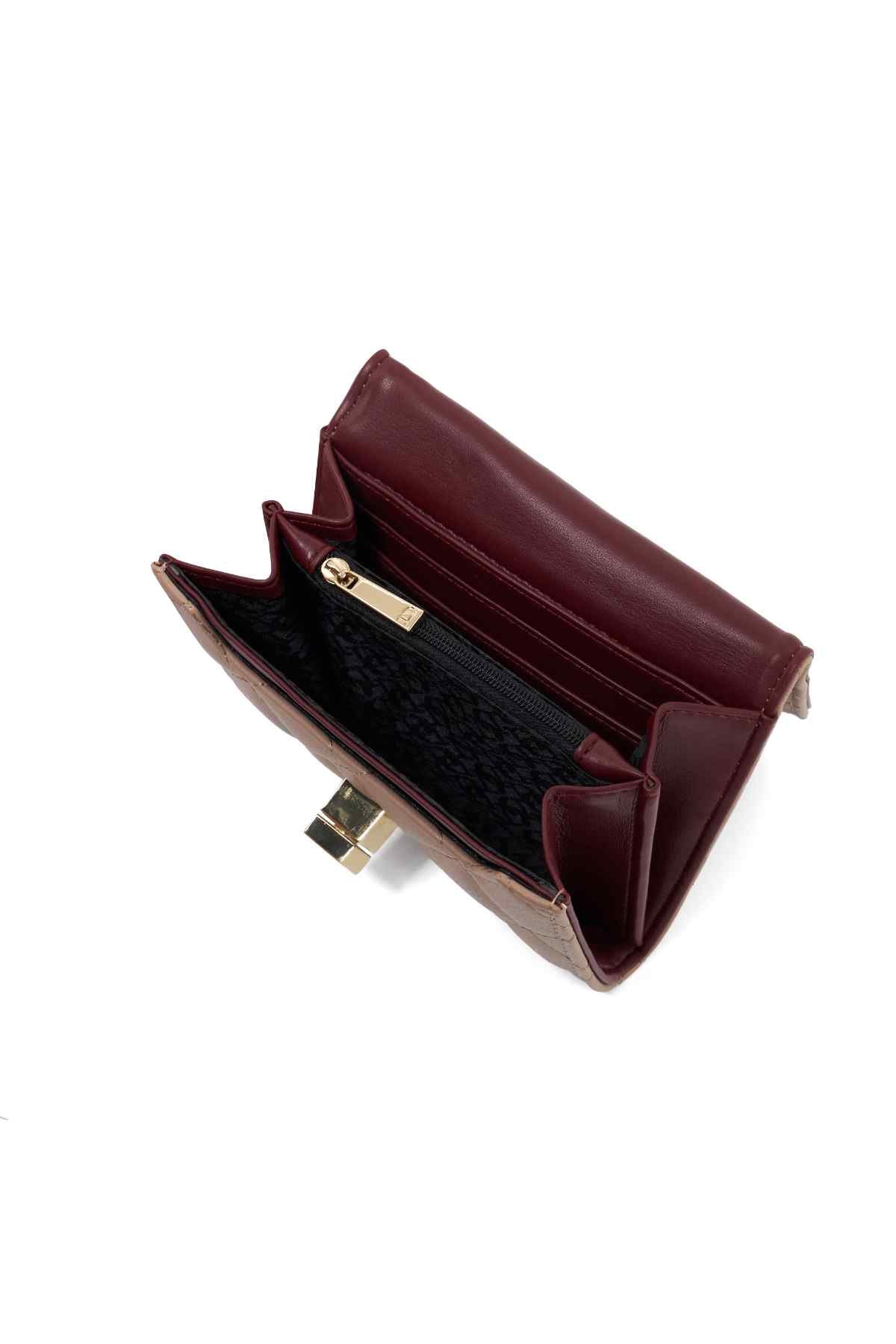 Burgundy wallet interior with card slots and gold-tone clasp