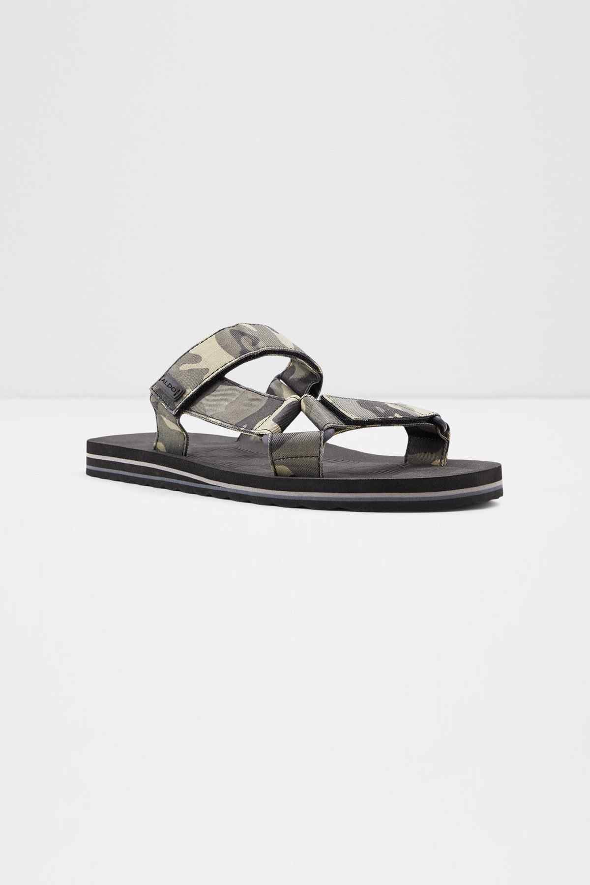 Black/olive camo slide sandals with strappy upper and textured dark rubber sole