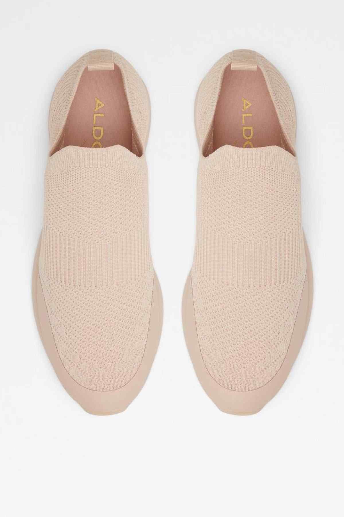 ALDO light pink slip-on knit sneakers shown with branded insole