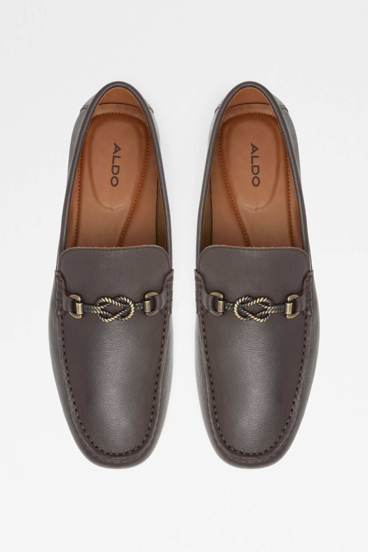 ALDO dark brown leather loafers pair with gold-toned bit hardware and tan lining