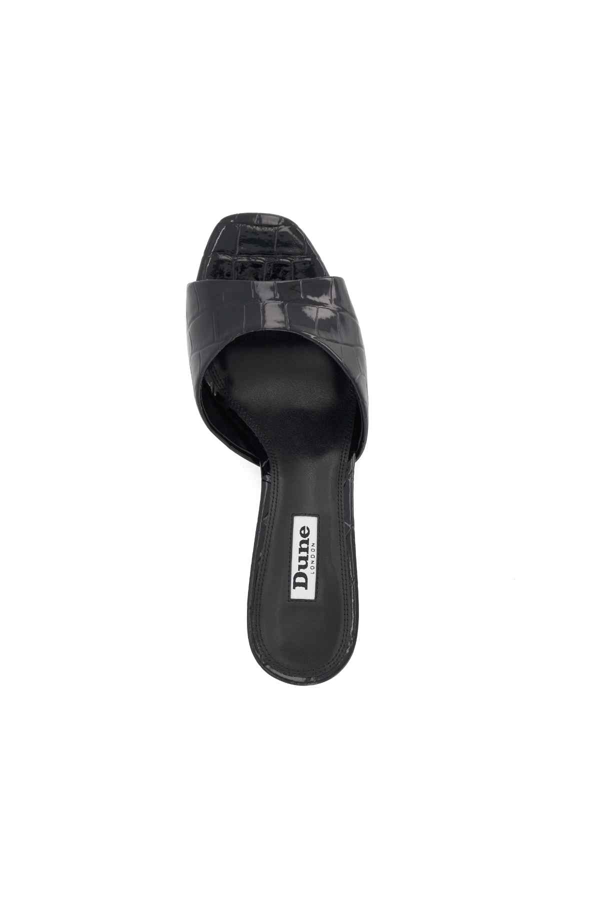 Black mule slide with open toe; Dune logo on footbed