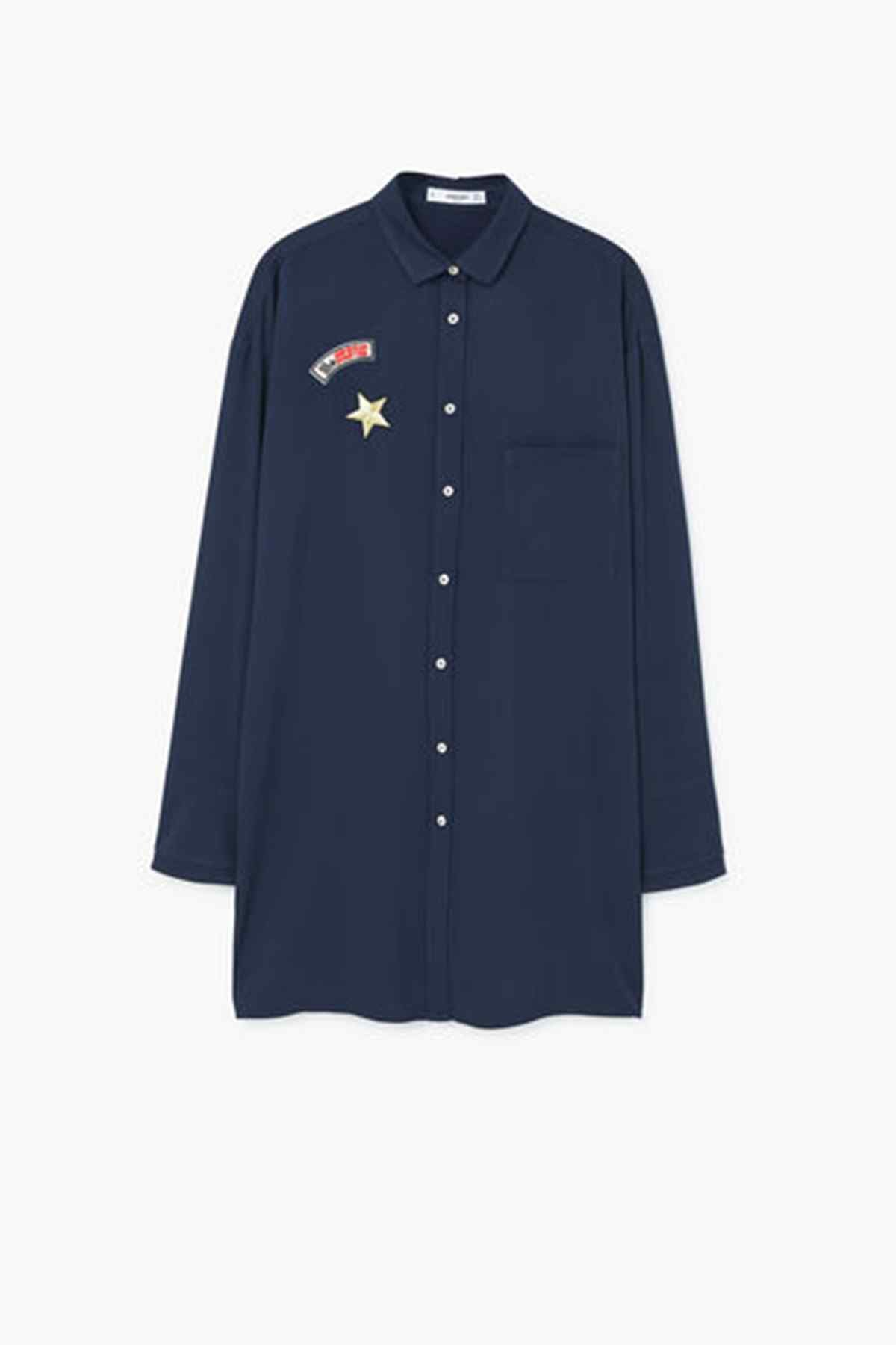 Navy long-sleeve button-up shirt with chest star and badge detail
