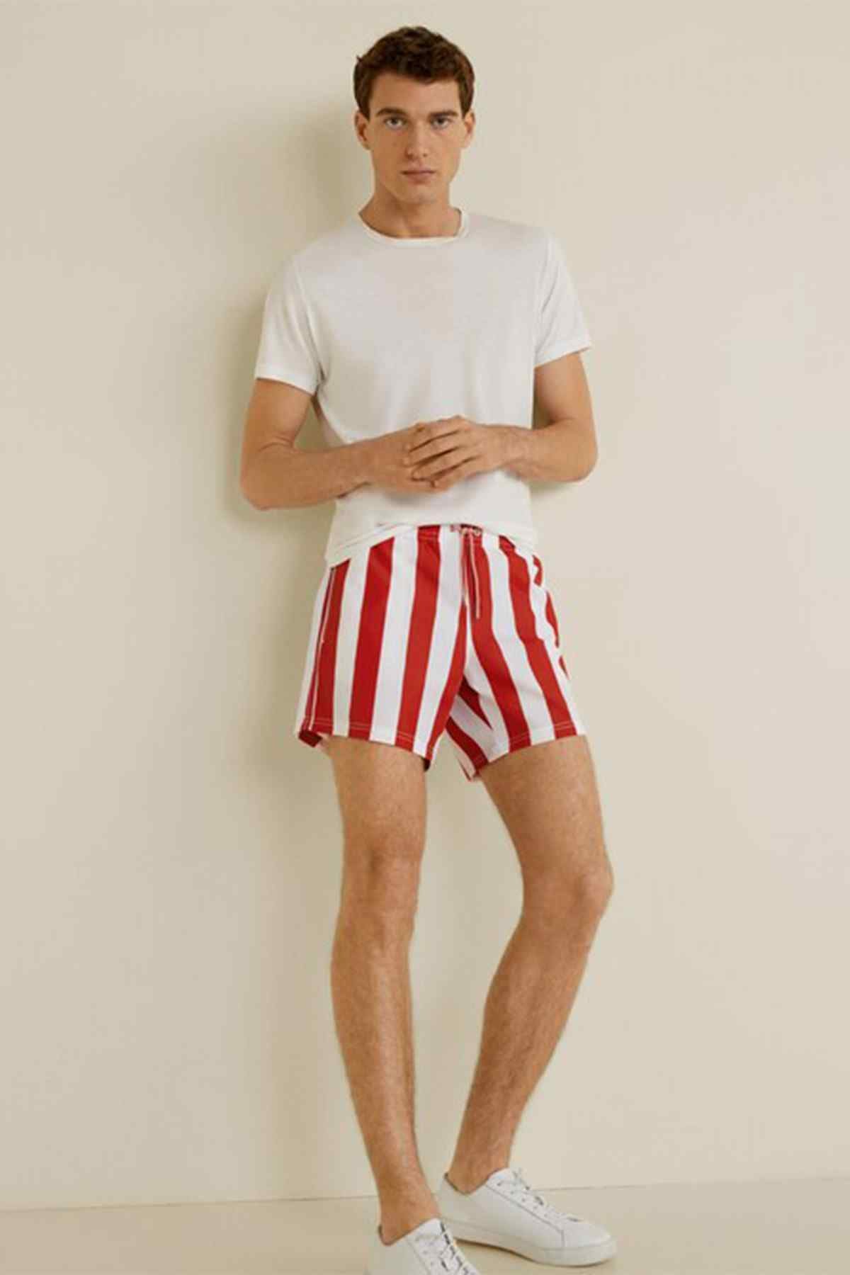 Red and white vertical striped shorts, above-knee cut, front view
