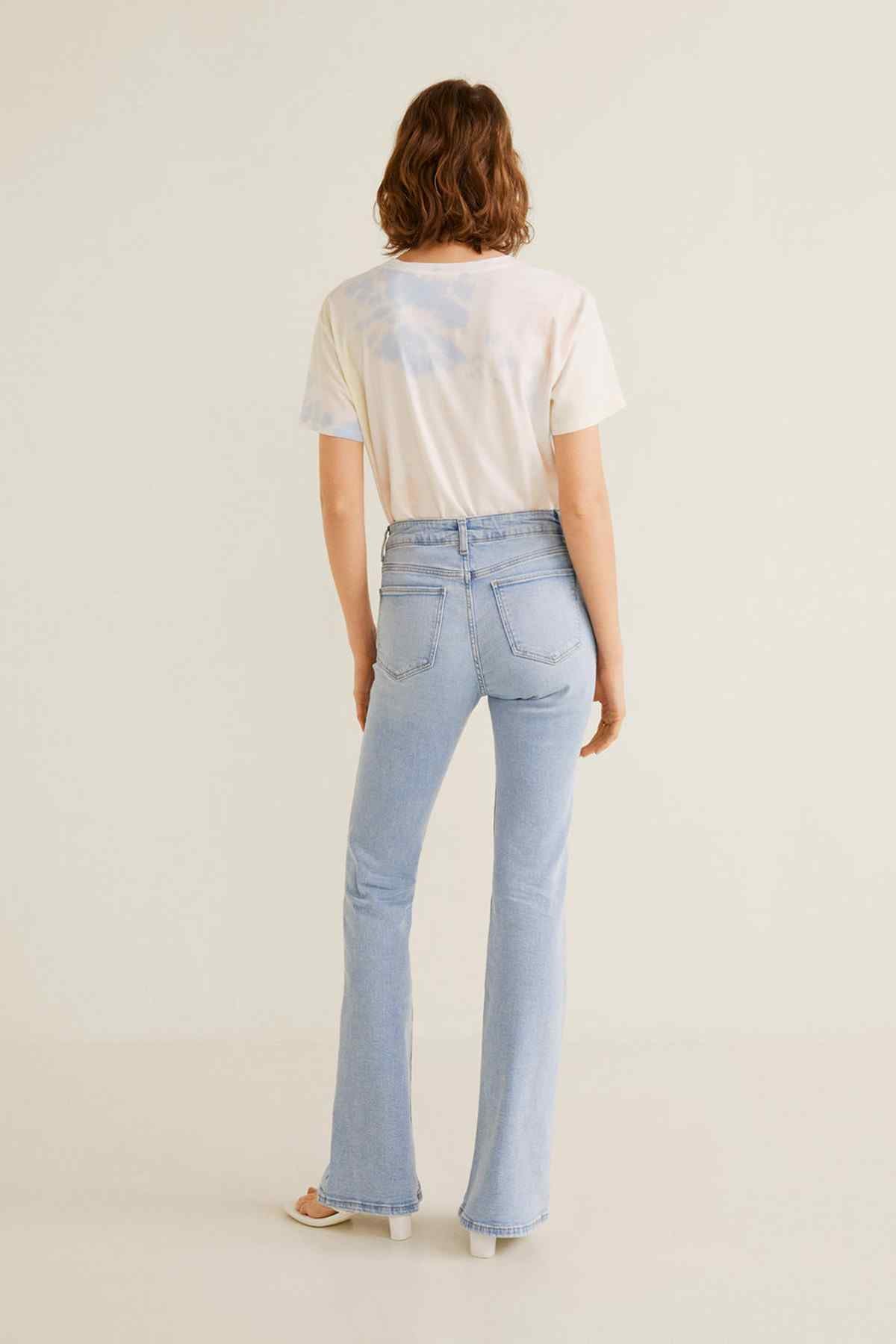 Light blue denim wide-leg jeans from back view with rear pockets
