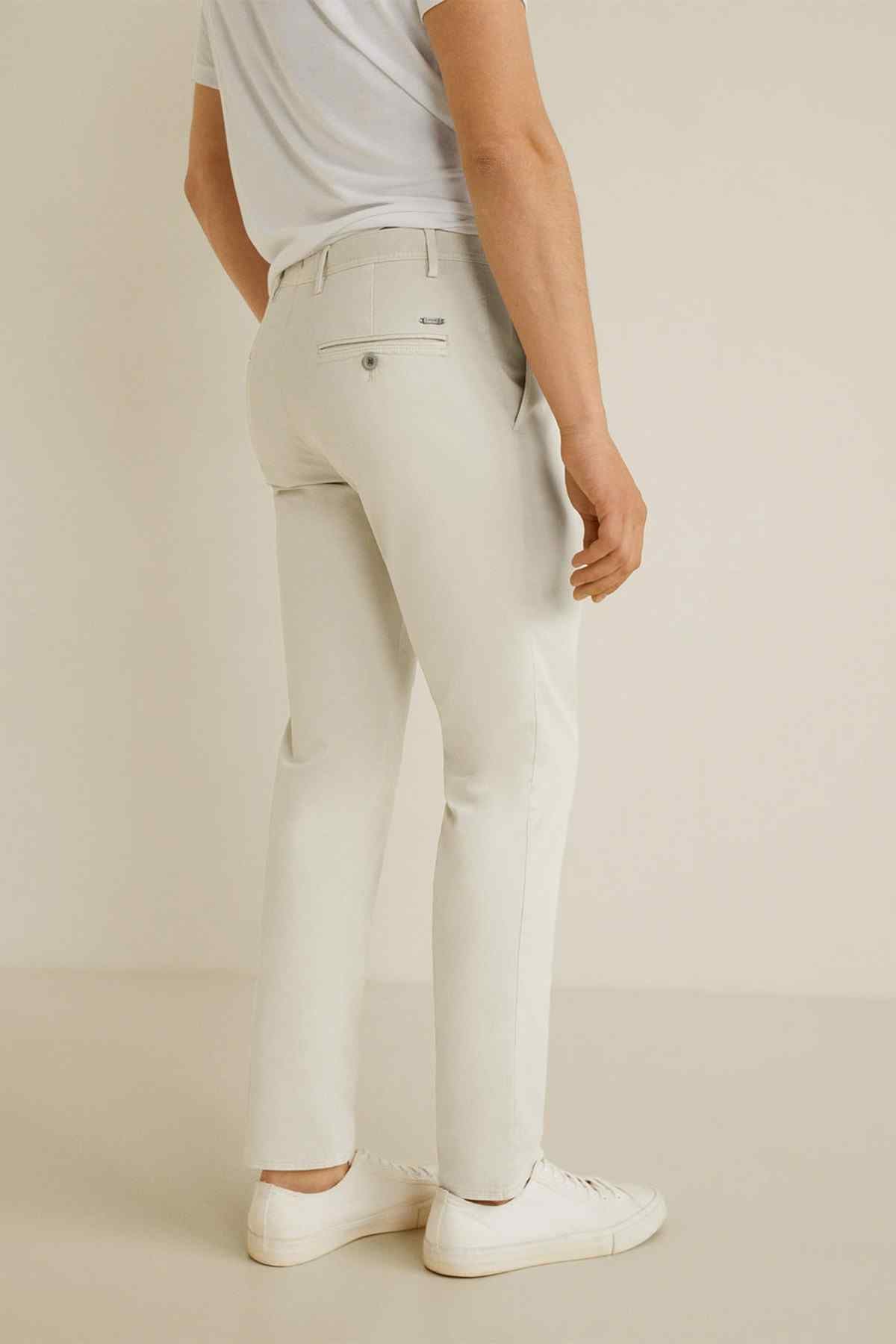 Light grey straight-leg jeans, visible back pocket and belt loops