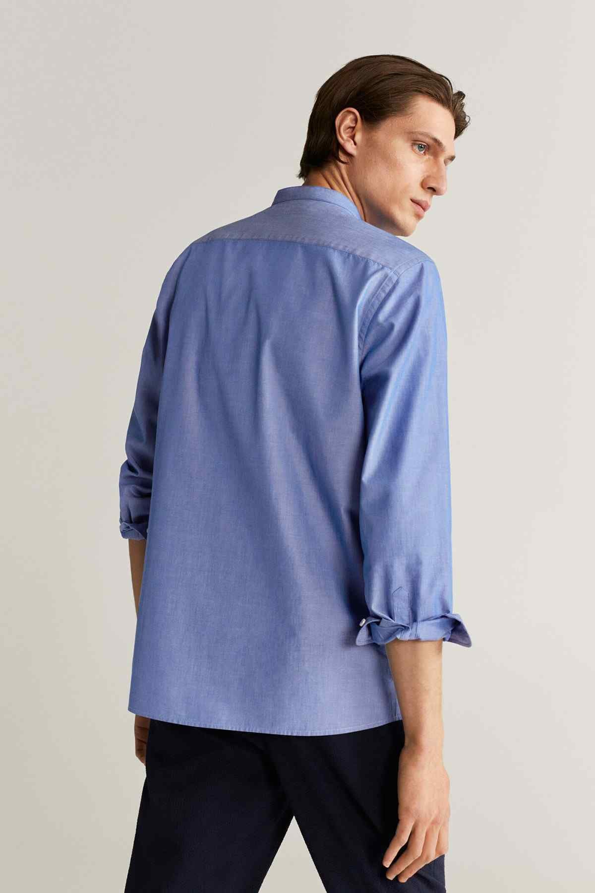 MANGO blue button-up shirt, back view with buttoned cuffs