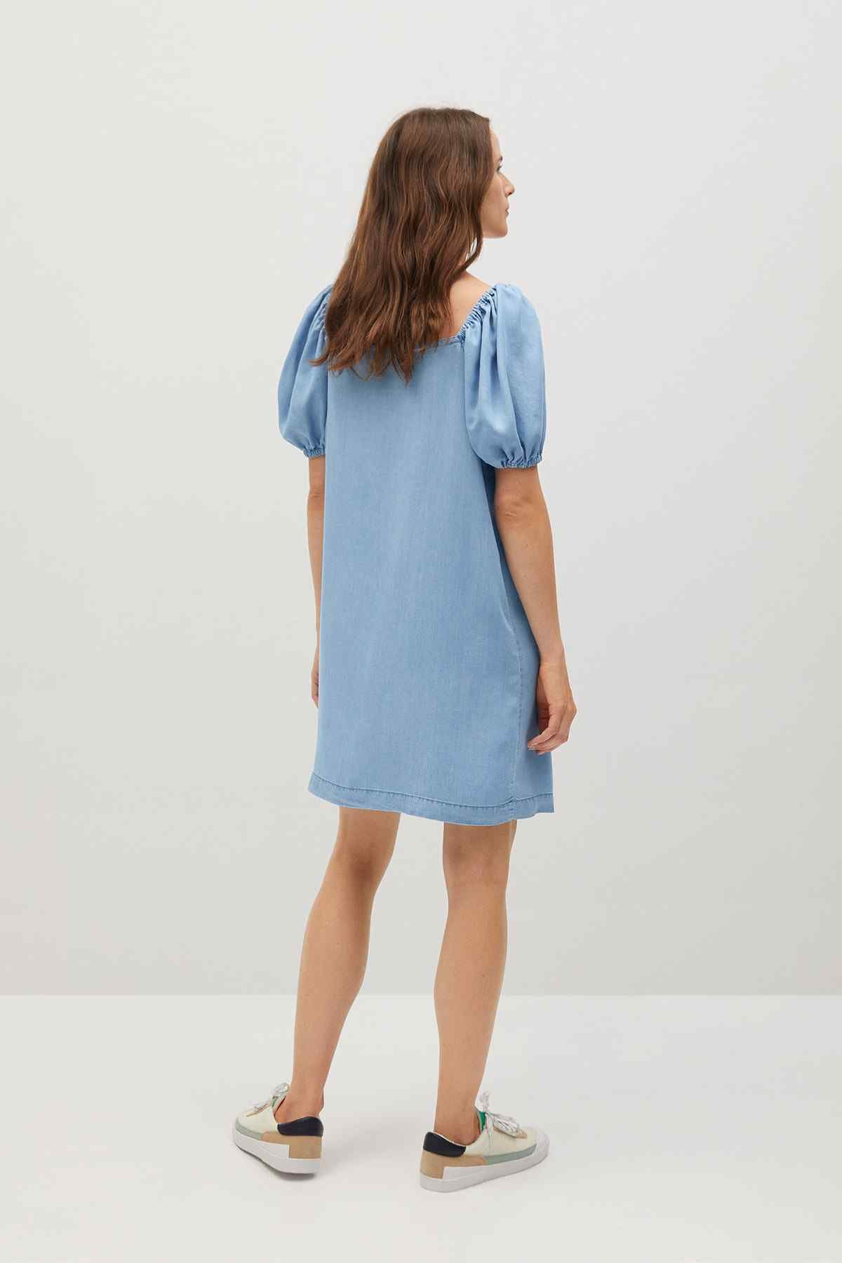 Light blue mini dress from back with short puff sleeves
