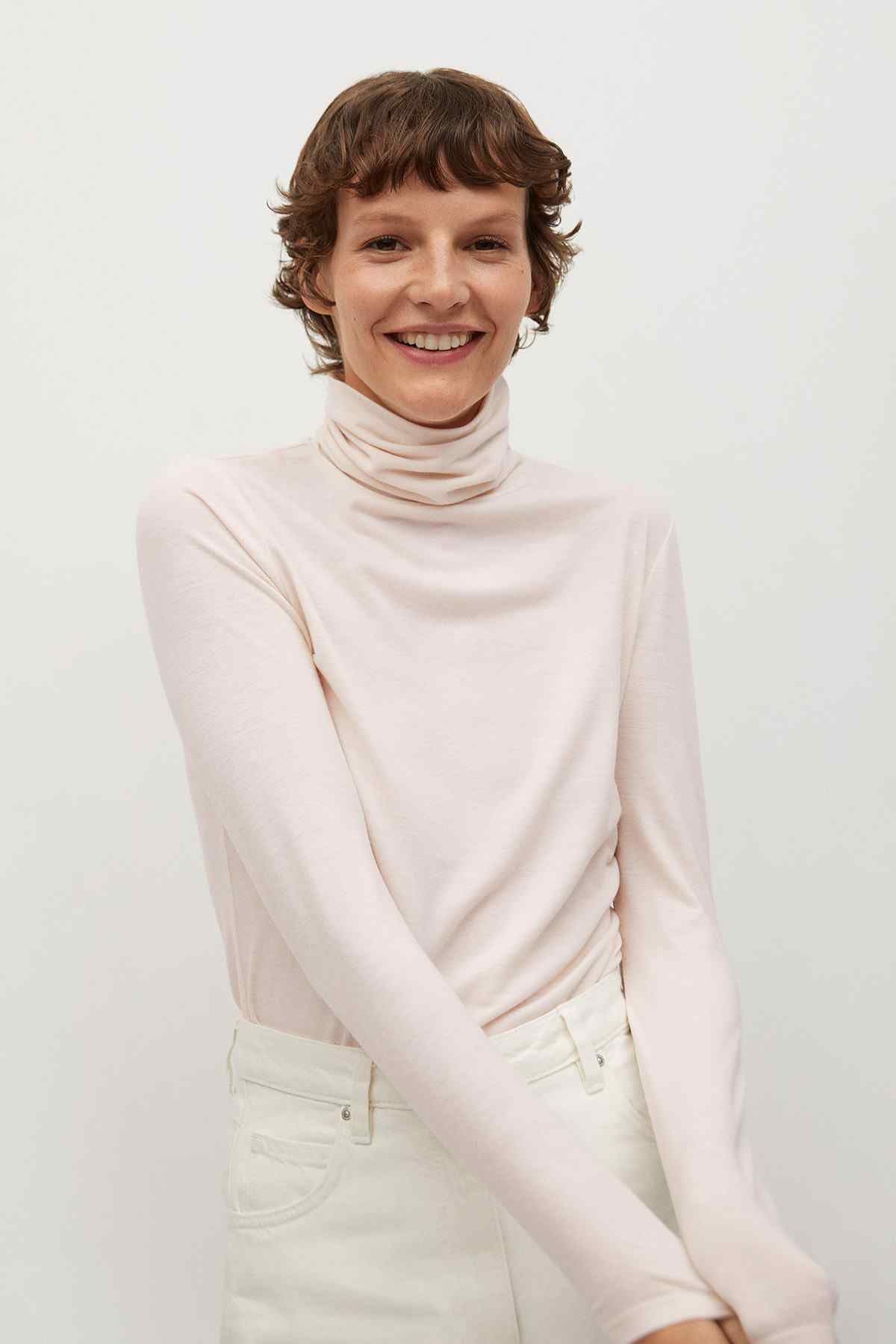 Light pink turtleneck long-sleeve top