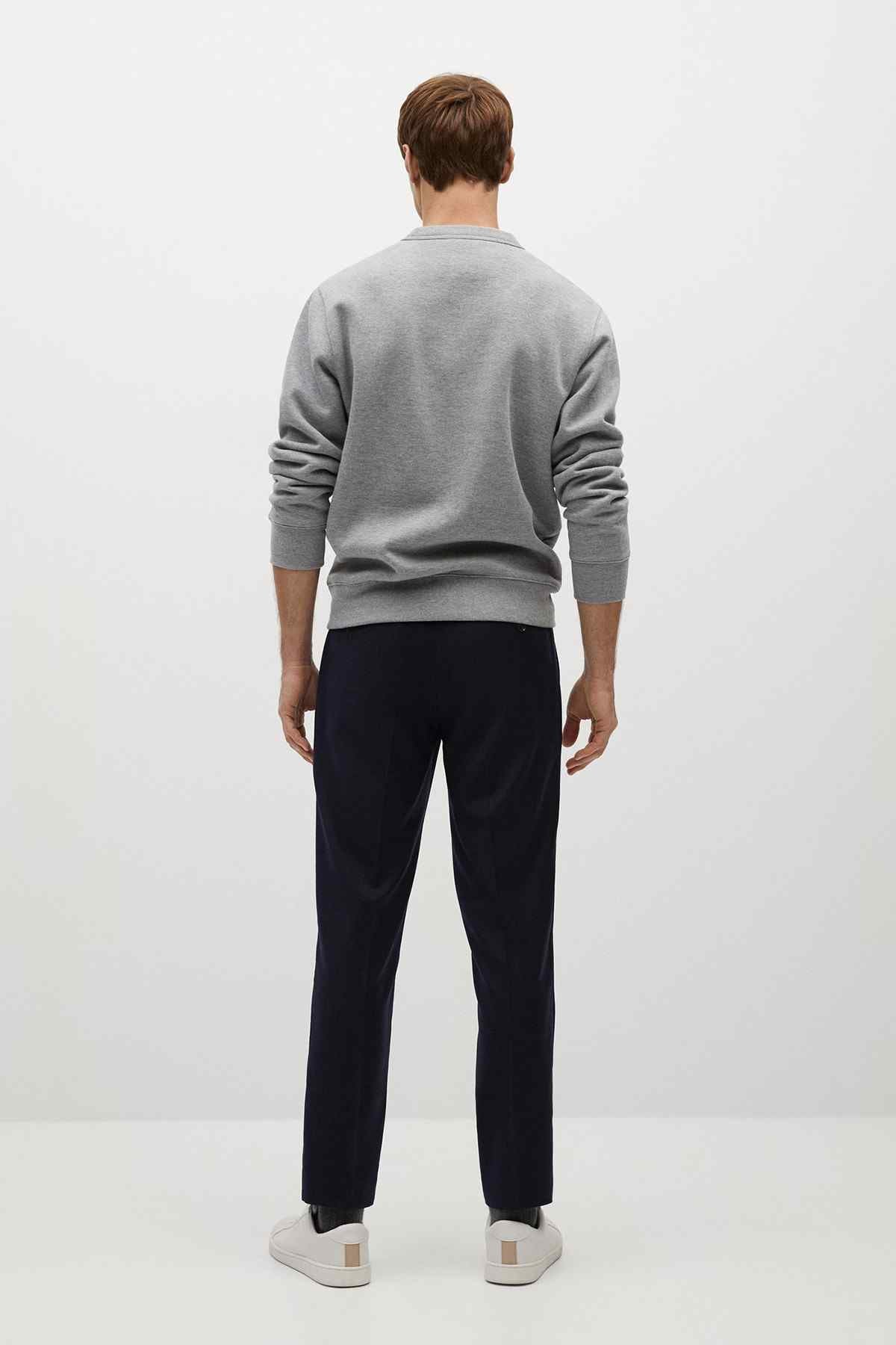 Men's heather grey crewneck sweatshirt back view with long sleeves and ribbed cuffs