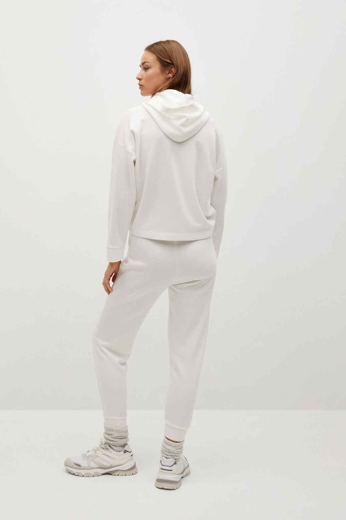Off-white pullover hoodie with hood paired with matching jogger pants