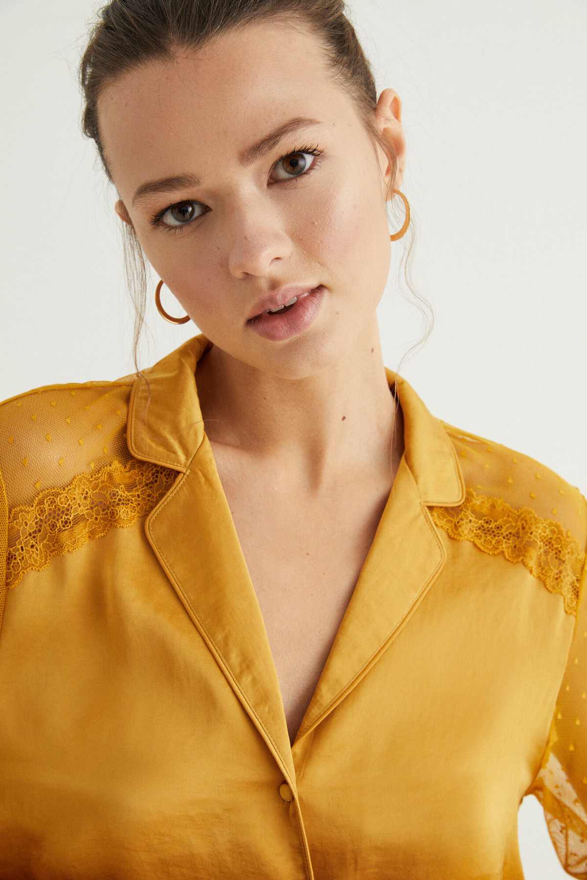 Yellow gold satin button collar pajama top with lace yoke detail at shoulders