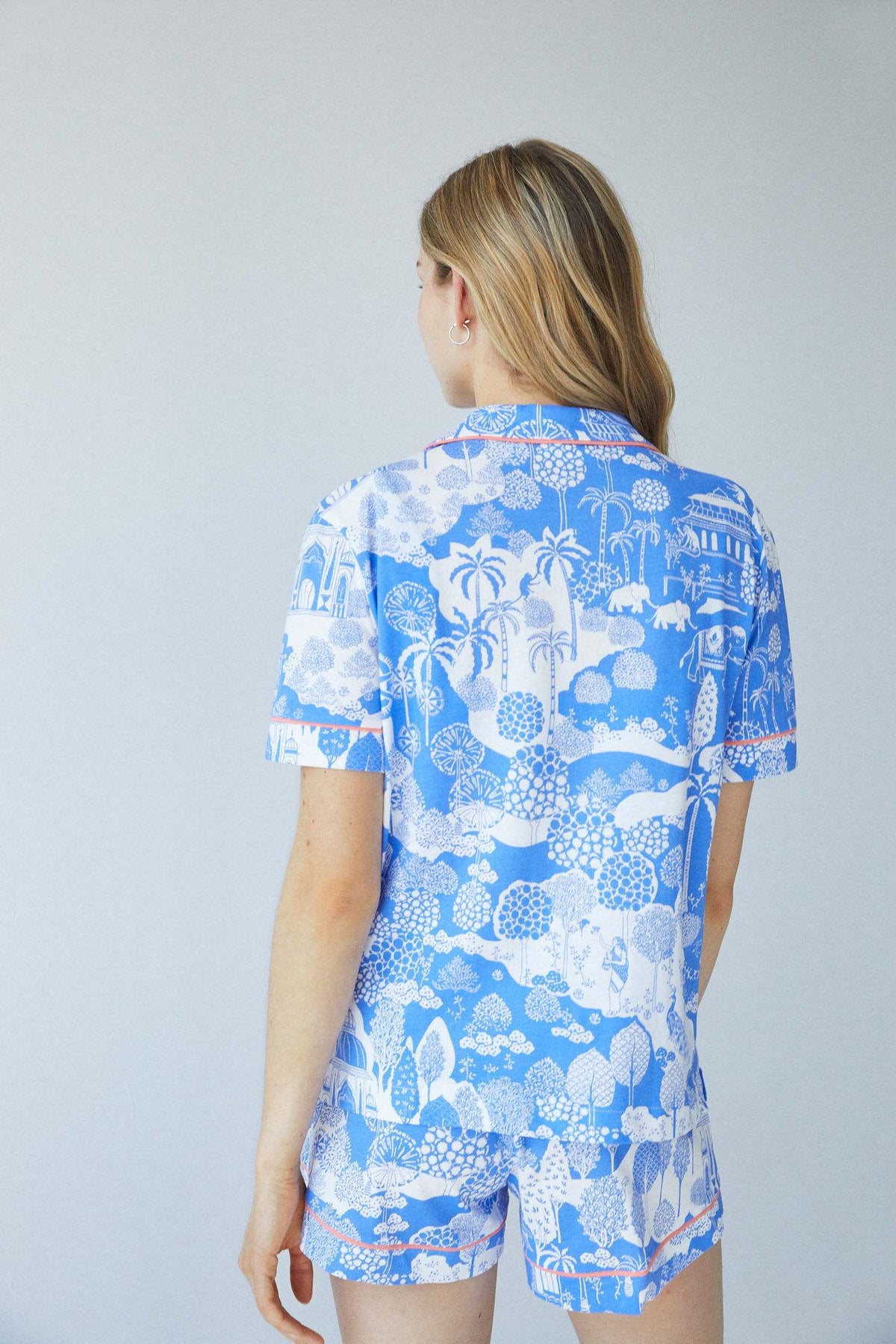Blue print pajama set back view with short sleeves and matching shorts