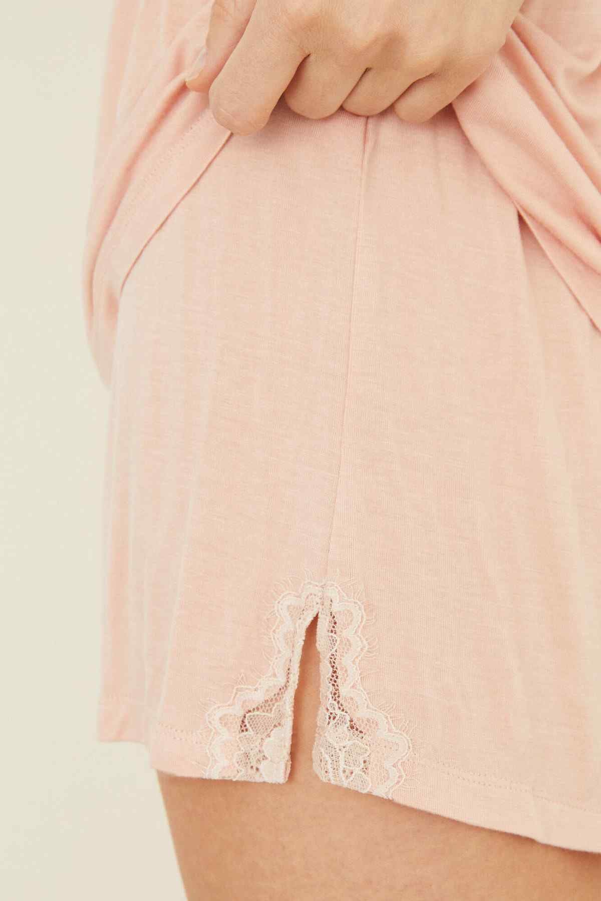 Women'secret light pink pajama shorts with lace hem and ruffled crossover