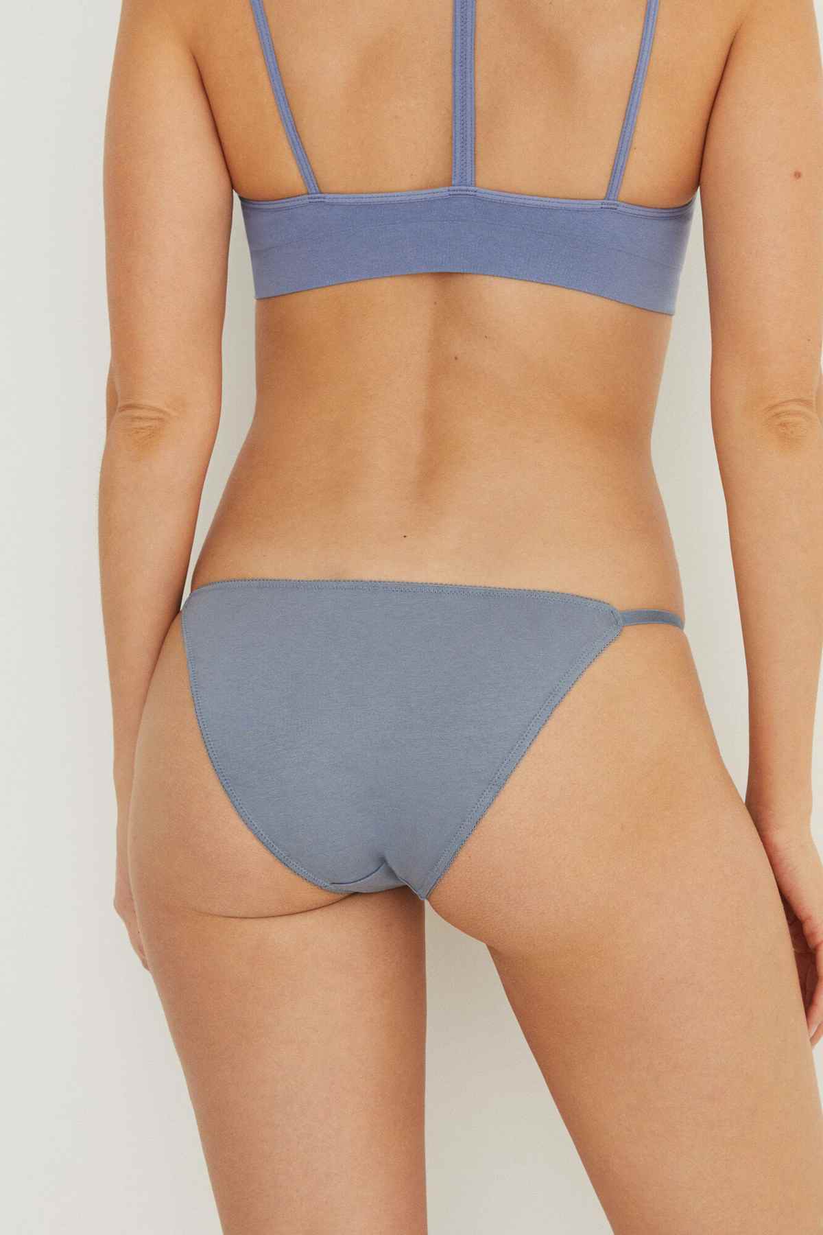 Medium blue bikini set with scoop bra and mid-rise briefs, thin straps