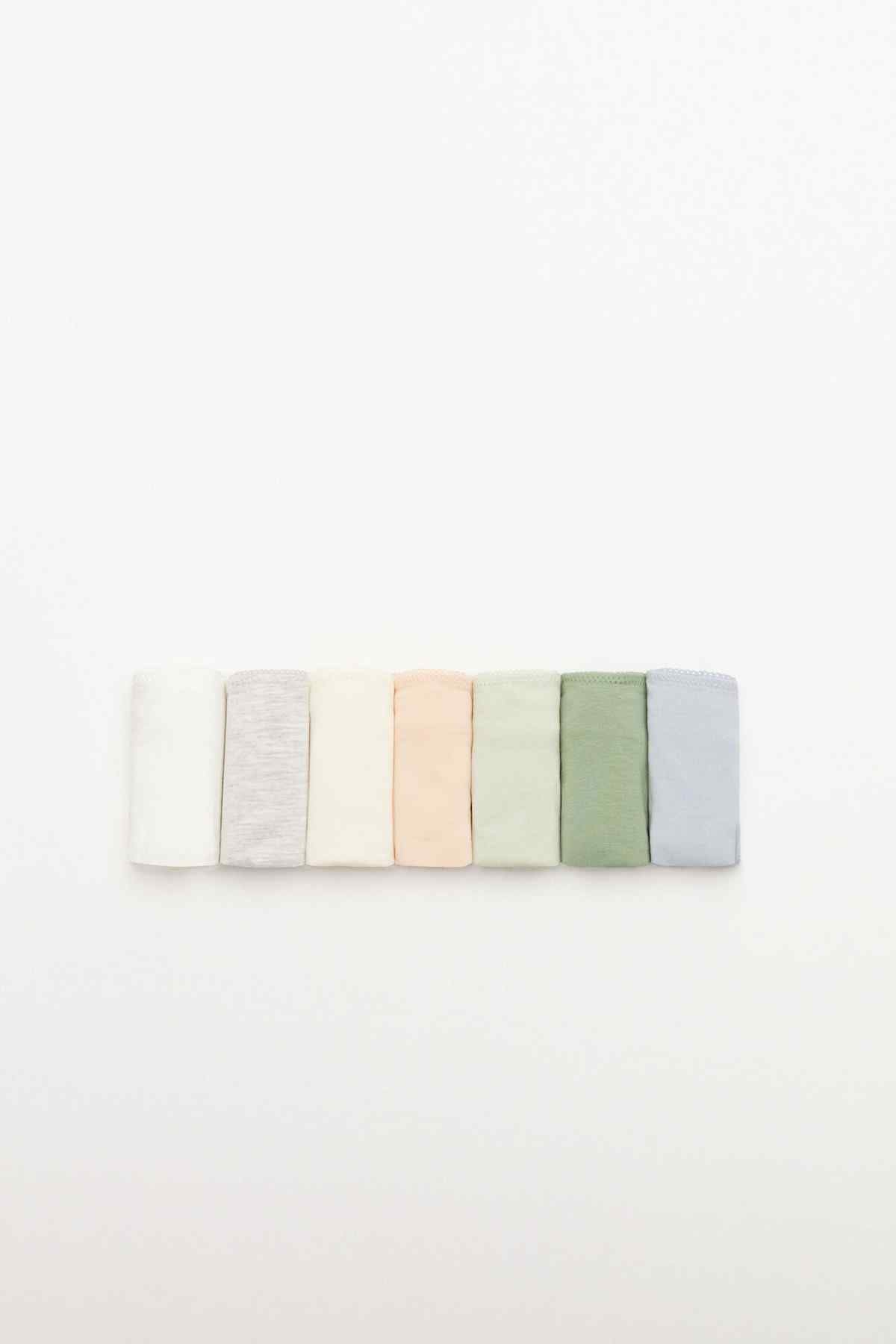 Color swatch strip for underwear fabric: off-white, gray, peach, olive, and slate blue