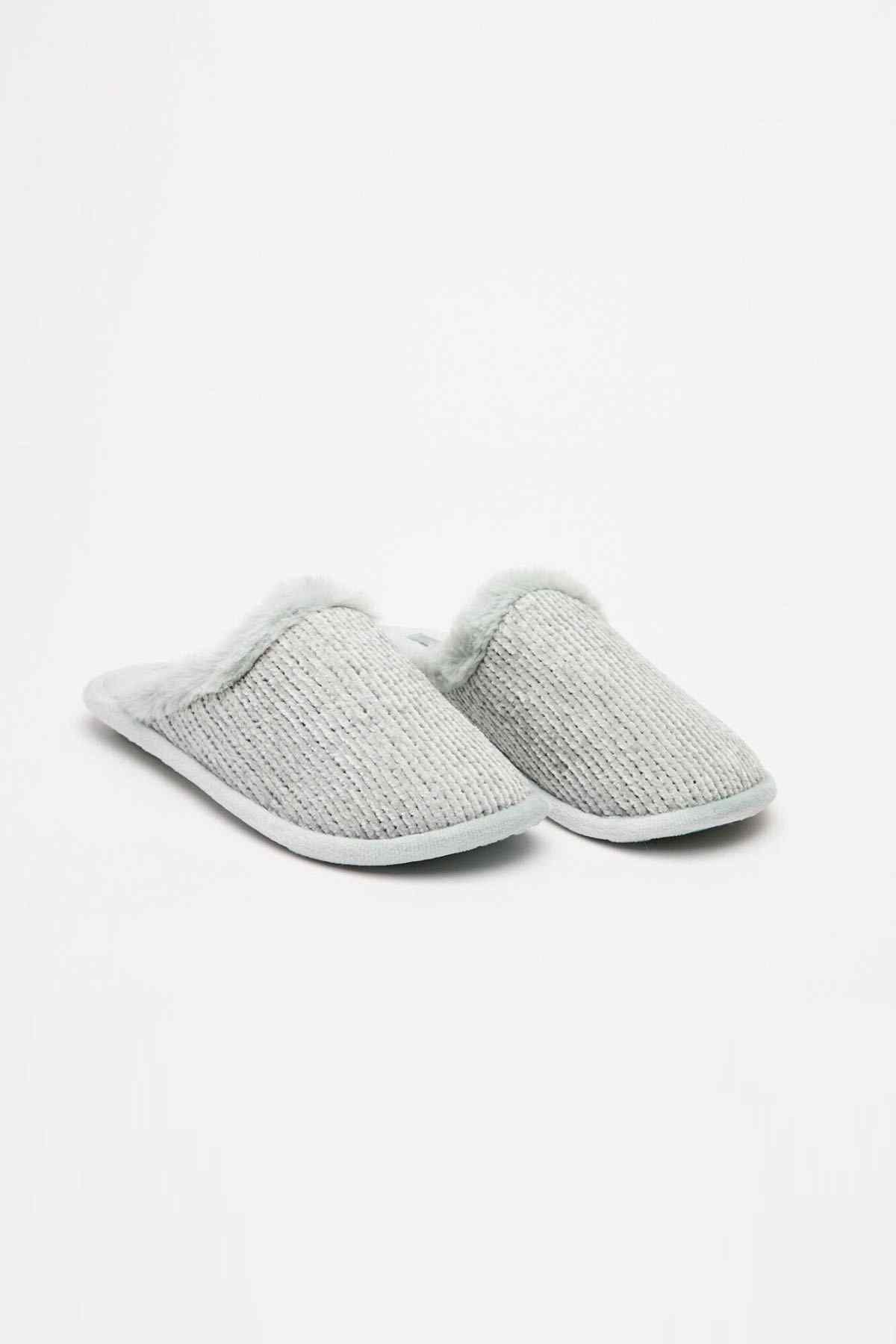 Women'secret pair of light gray knit slide slippers with soft faux-fur trim