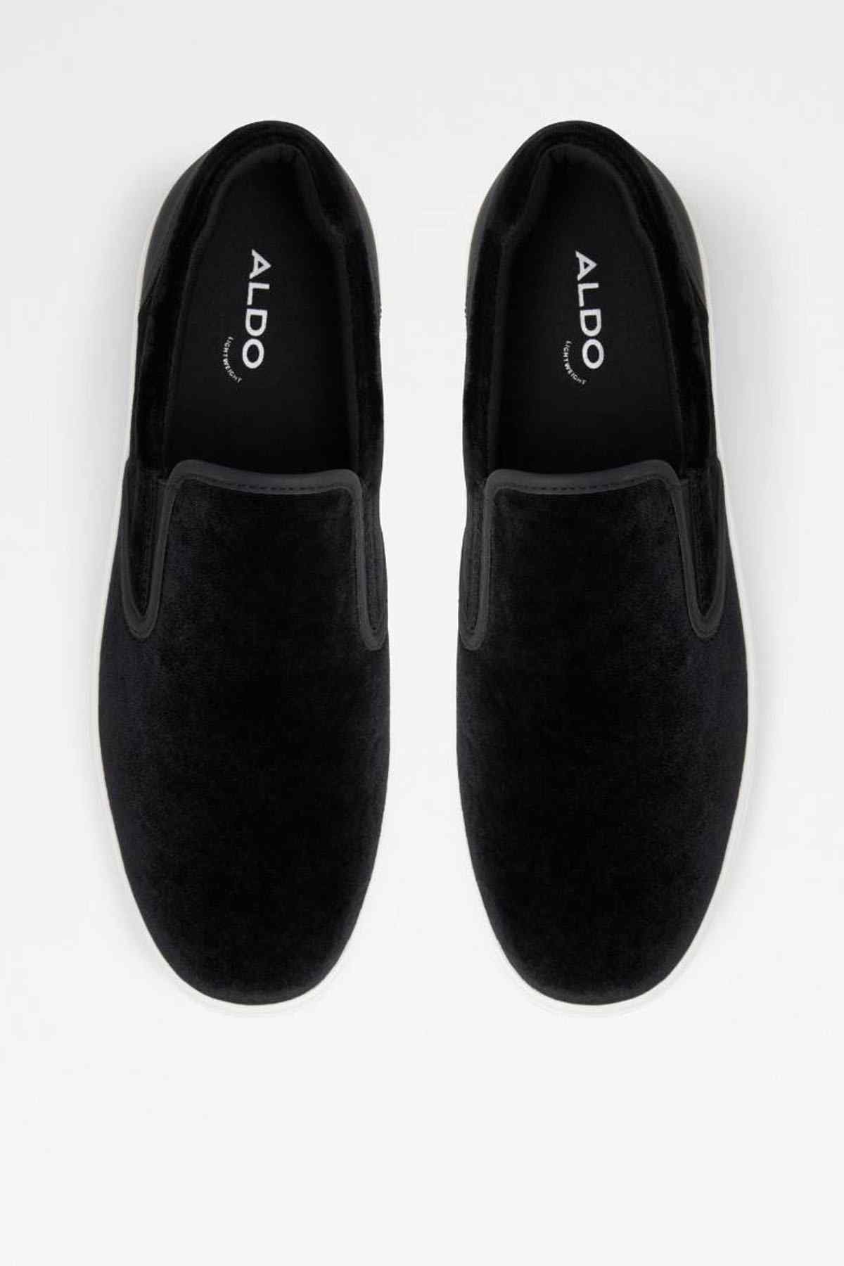 Pair of black ALDO slip-on sneakers, ALDO logo printed on inner sole