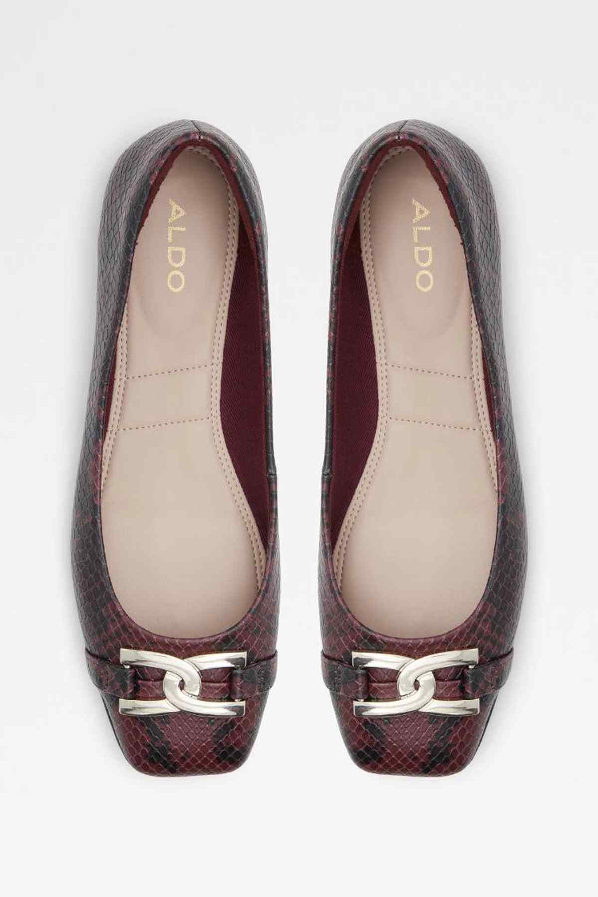 Pair of ALDO red snake-print flats with gold buckle and beige insoles