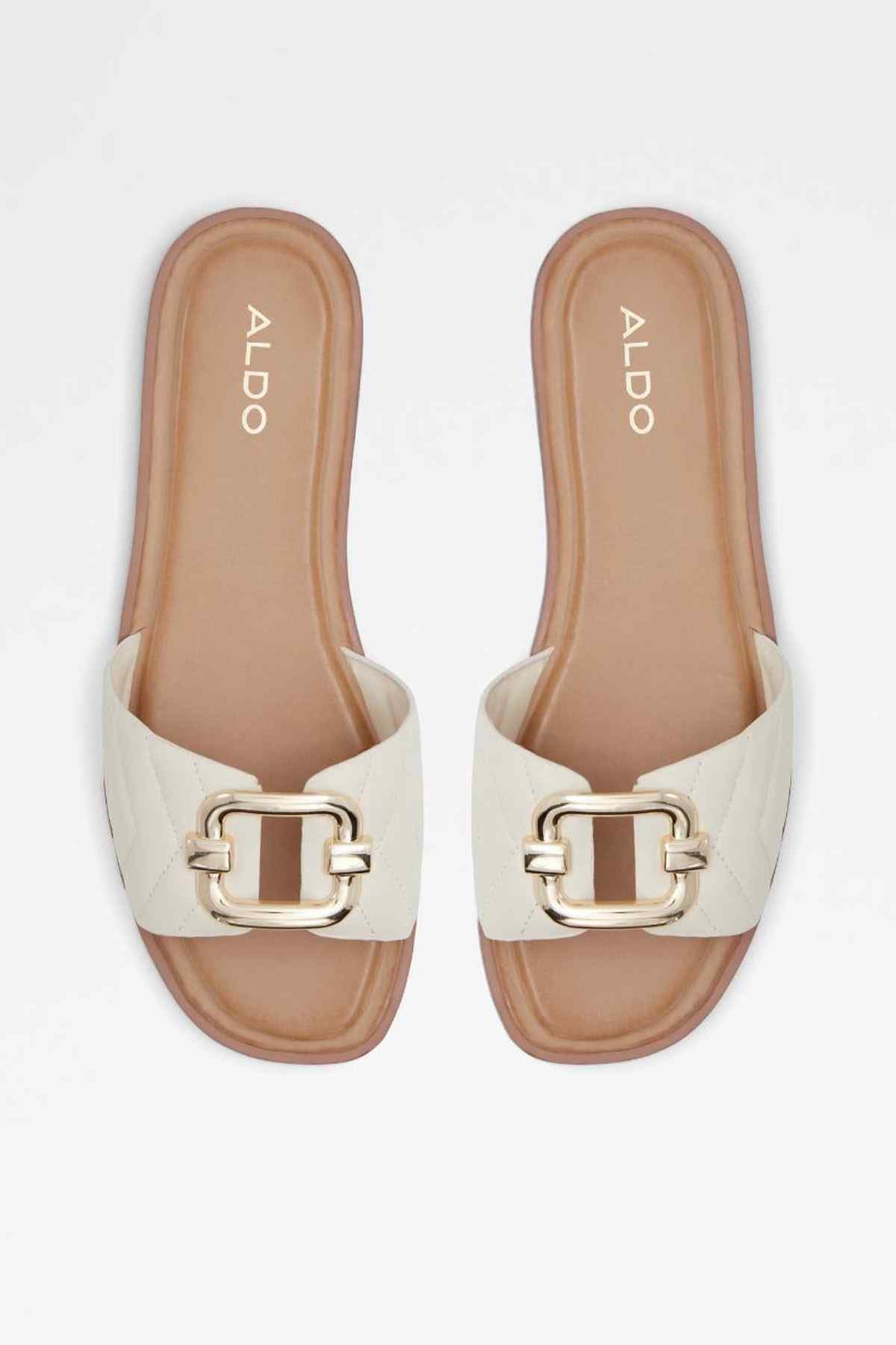 Cream ALDO slide sandals, open toe, gold buckle, tan footbed