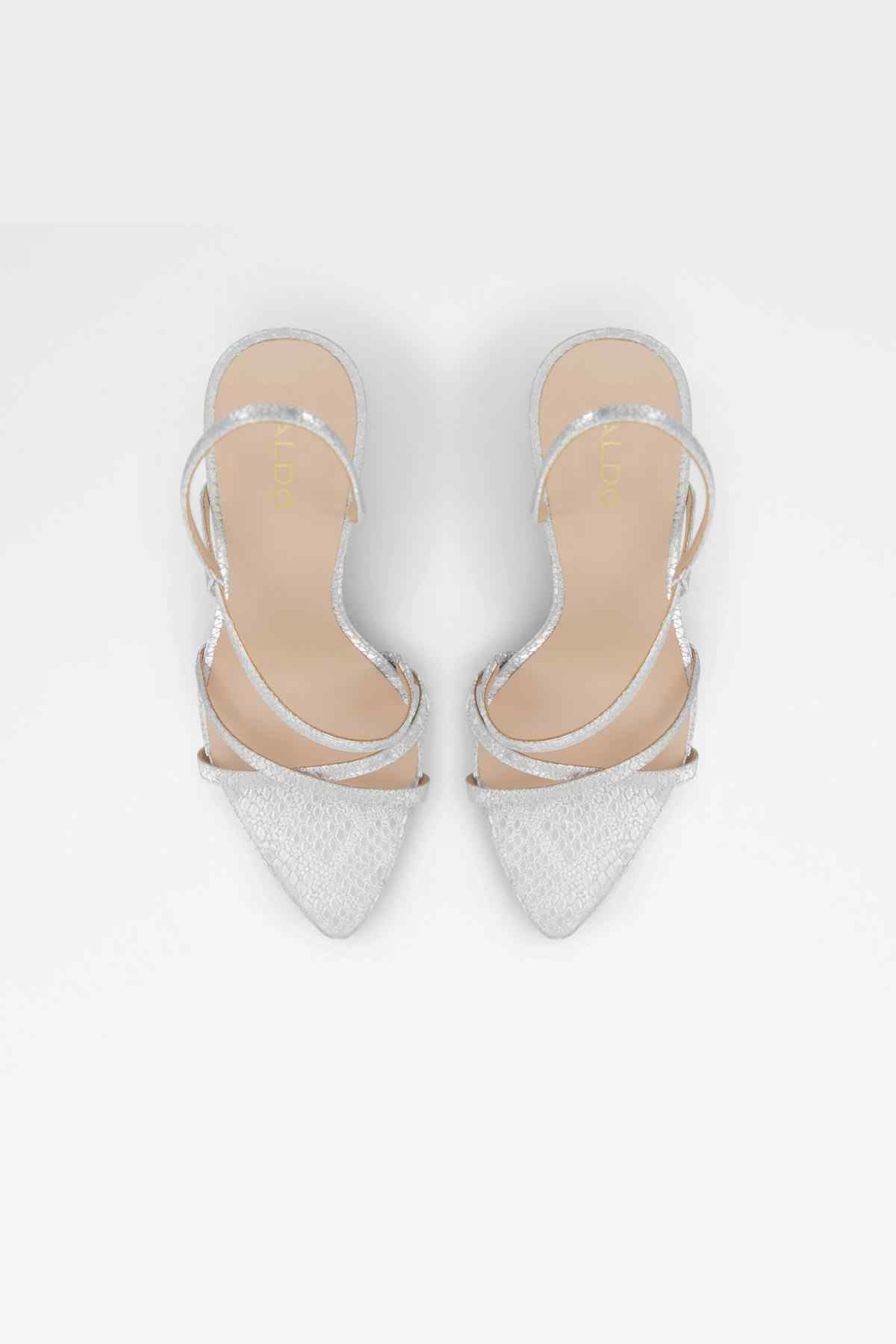 Pair of silver strappy high-heel sandals, open toe and ankle straps
