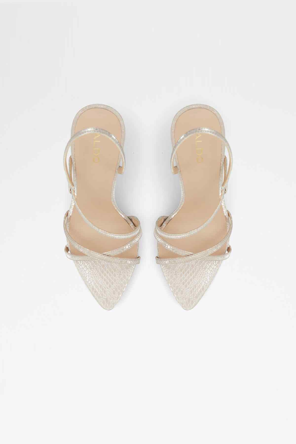 Pair of strappy heeled sandals with pointed toe and metallic pink finish