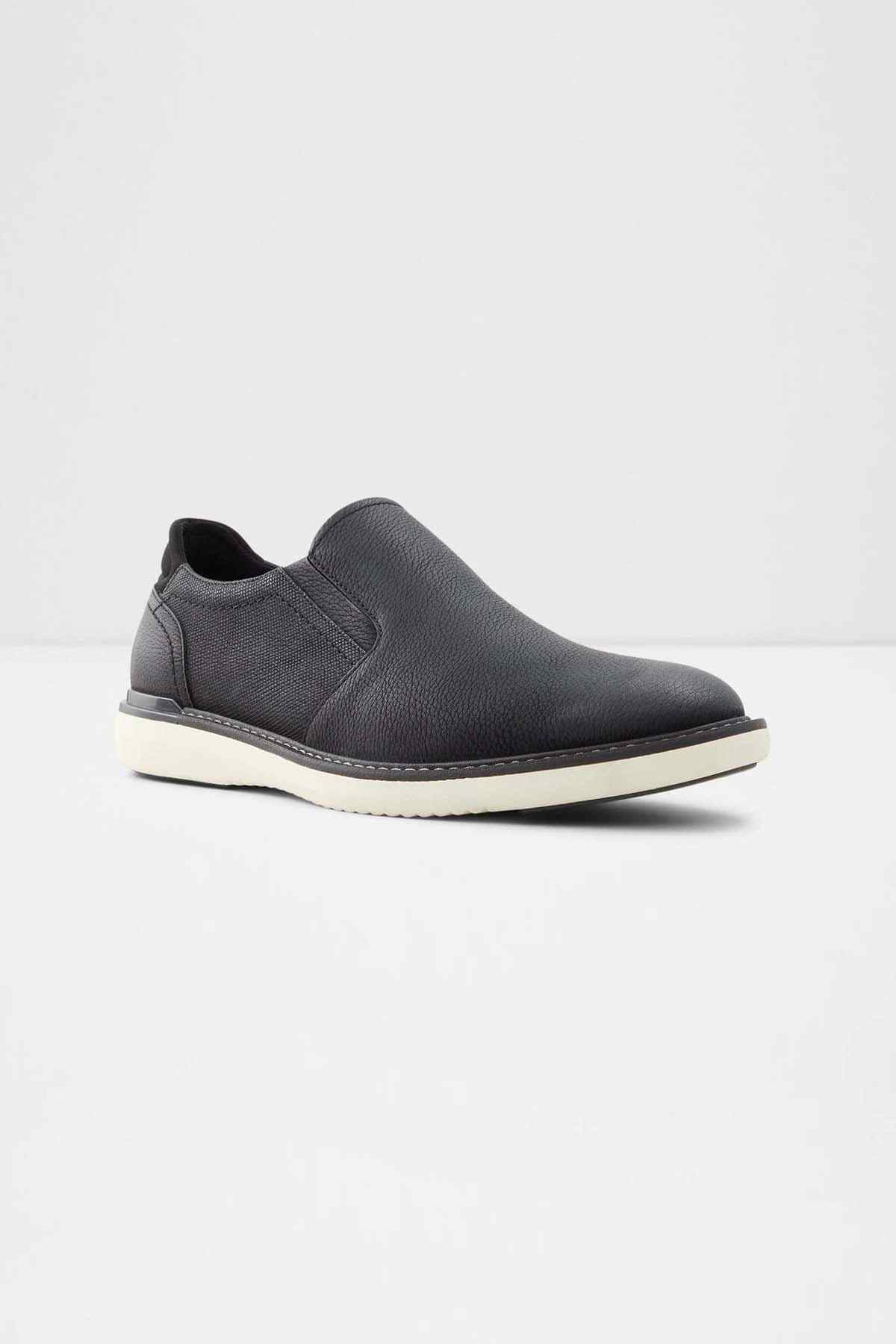 ALDO black leather slip-on shoes with stitched vamp and white rubber sole