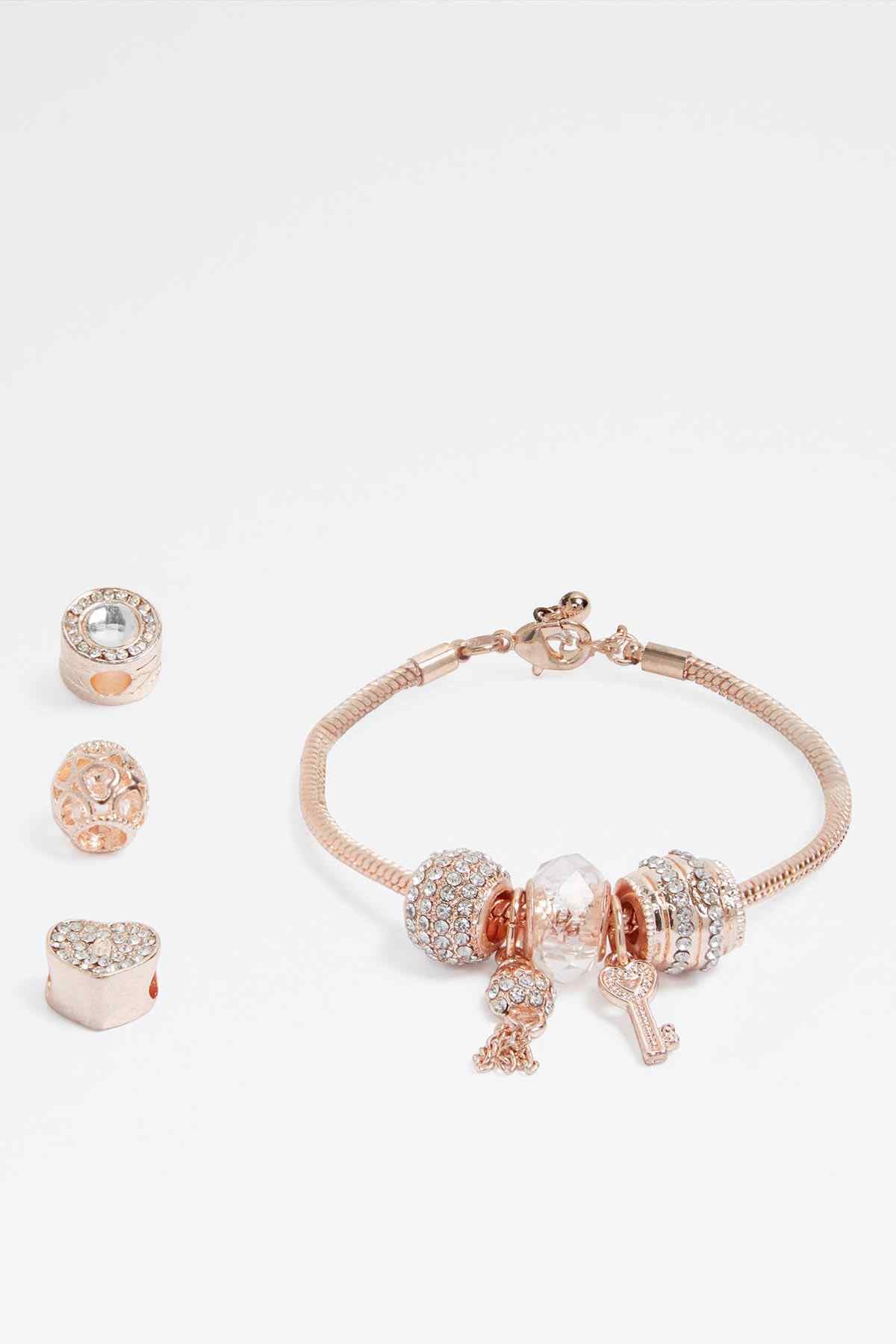 Rose gold charm bracelet with matching stud earrings set