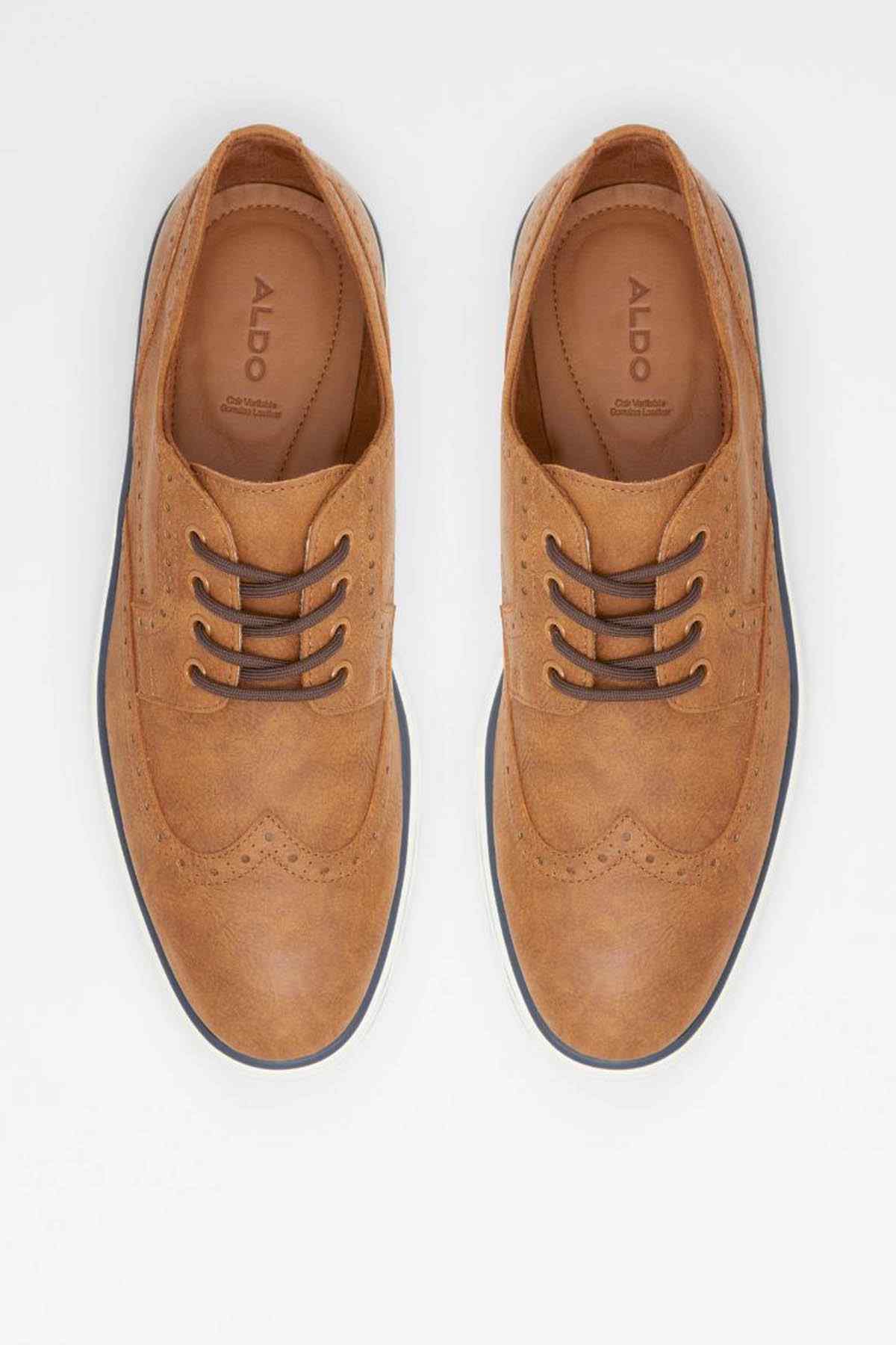 Cognac suede lace-up sneakers with dark soles, front view of two shoes