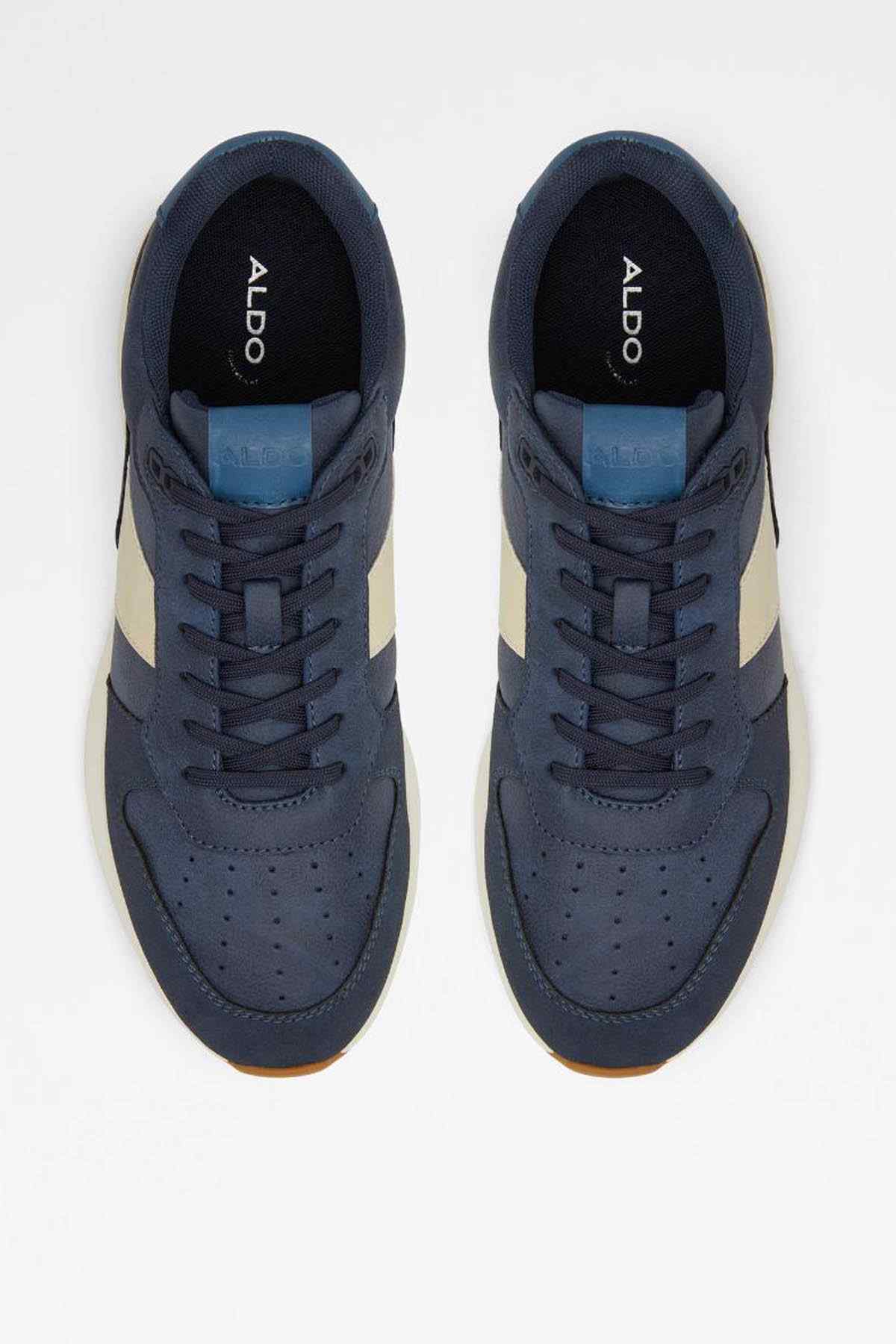 Navy sneakers showing ALDO logo on black insoles and lace-up eyelets