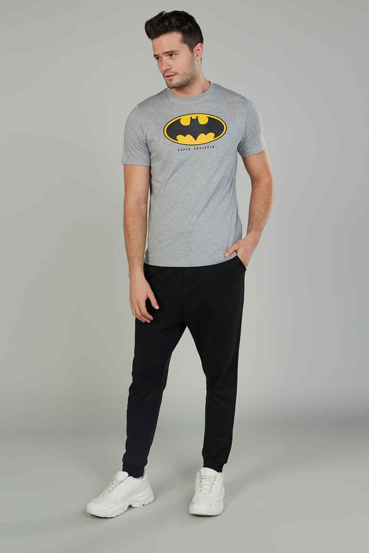 Black jogger pants with elastic waistband, tapered legs, ribbed cuffs