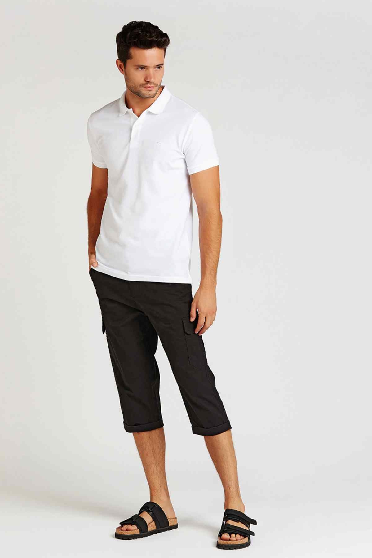 Black knee-length shorts with multiple pockets and cuffed hem