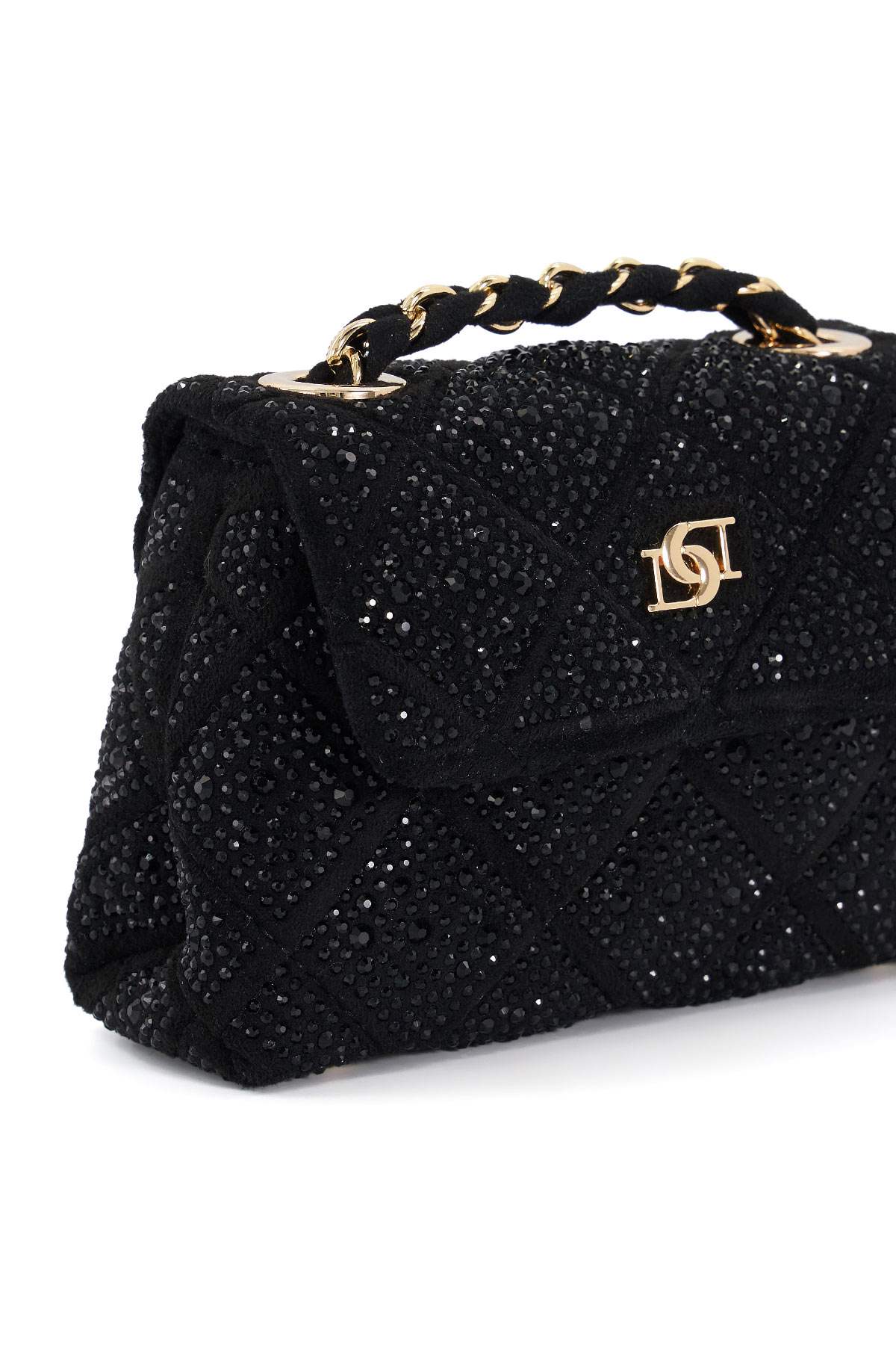 Close-up of black sequin flap handbag with gold logo and braided chain