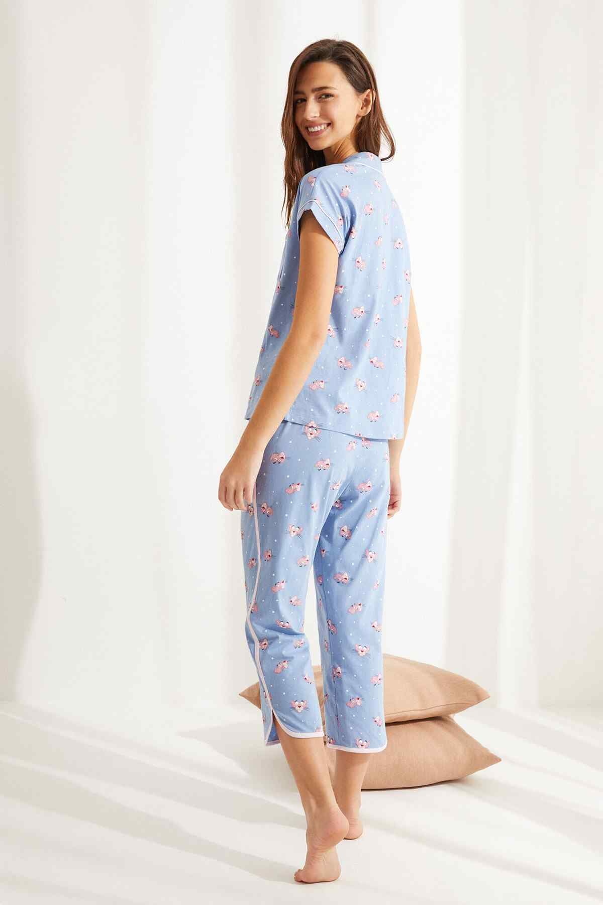 Light blue pajama set with button-front top and cropped pants, multicolor print