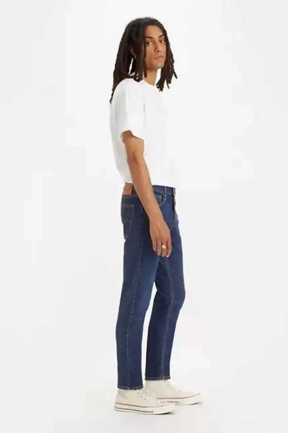Levi's dark indigo denim jeans, straight-leg fit with button closure and belt loops